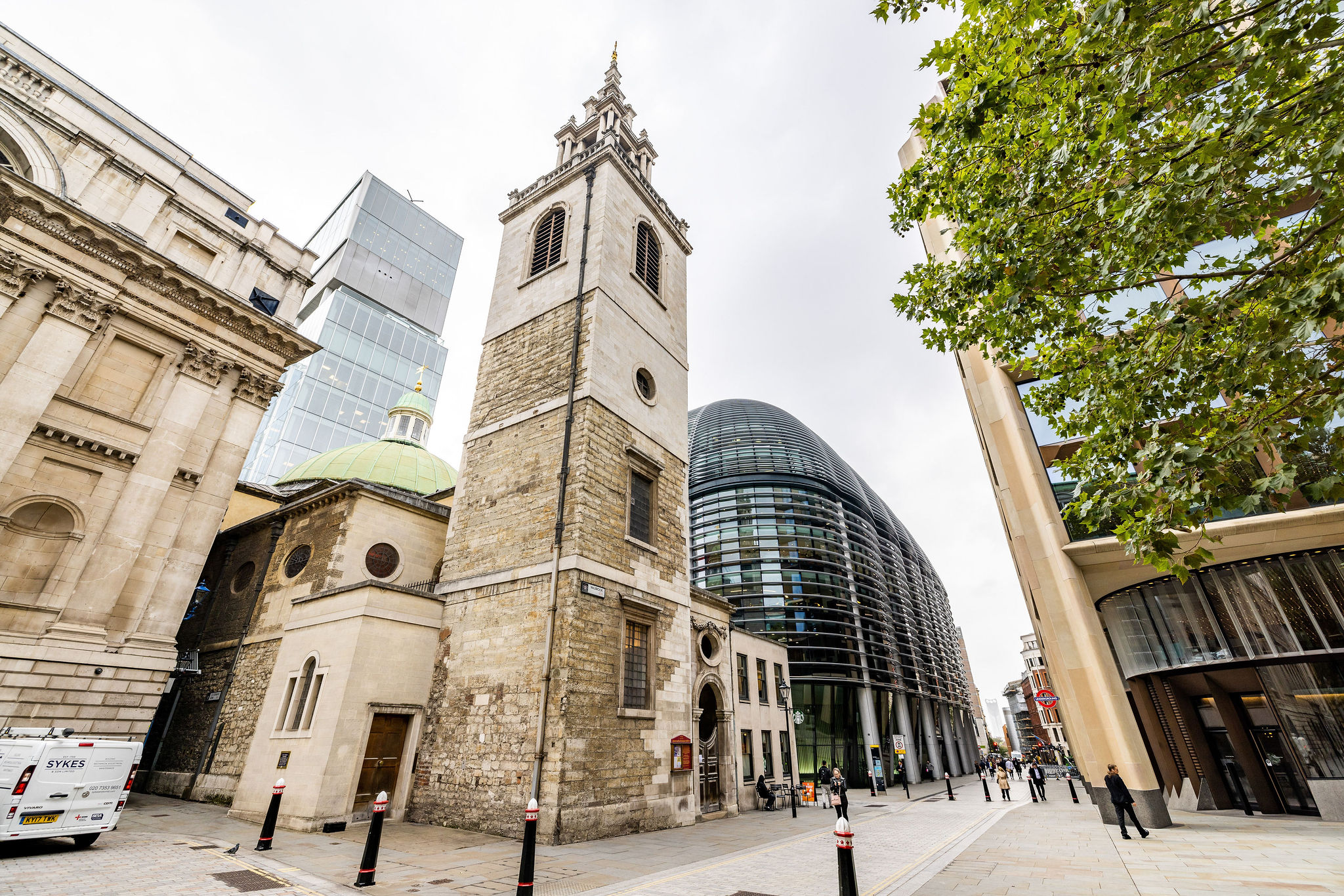 Event space in Mnuchah with historic stone tower and modern glass, ideal for unique gatherings.