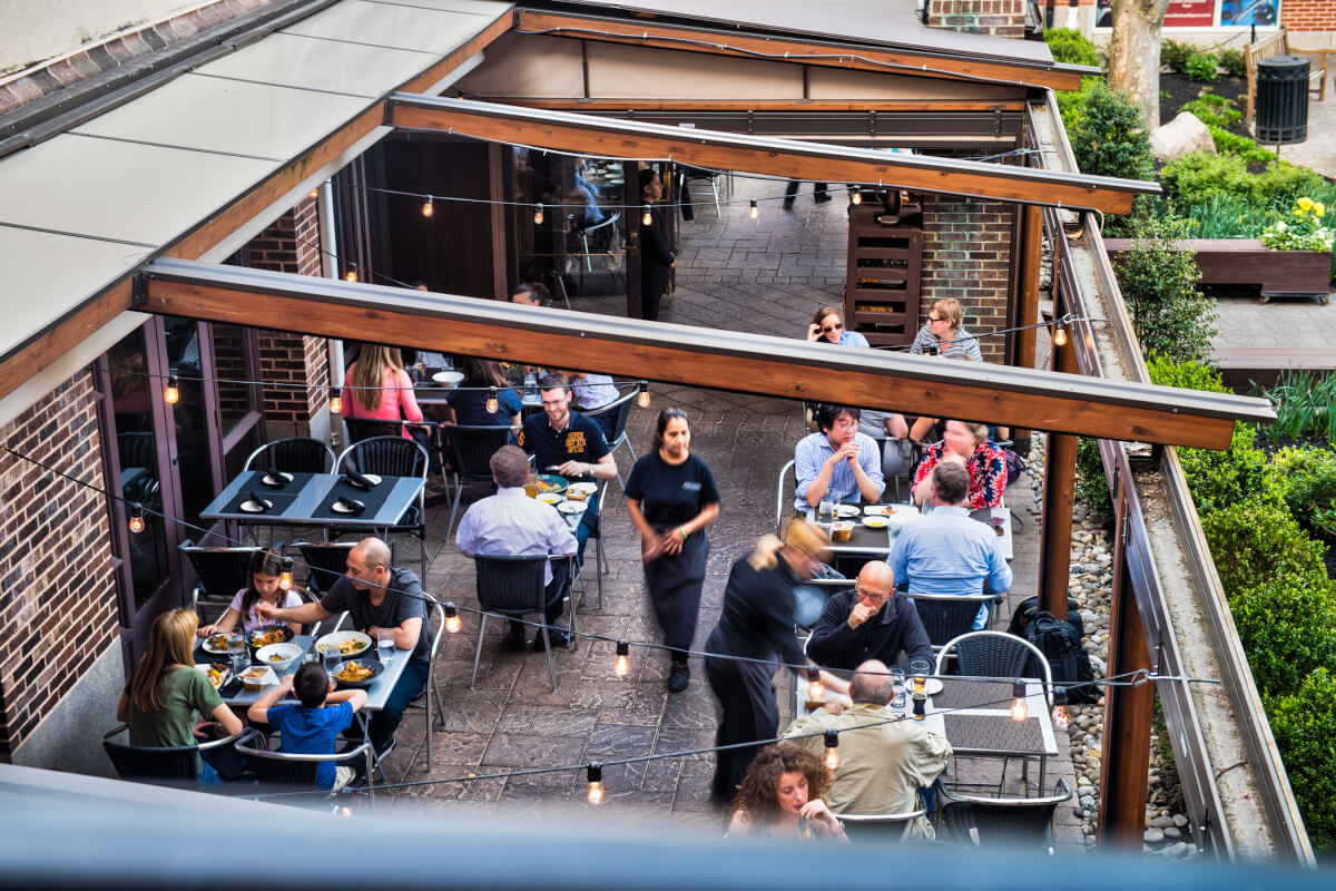 Private dining room at Mediterra Restaurant, ideal for events with vibrant outdoor seating.