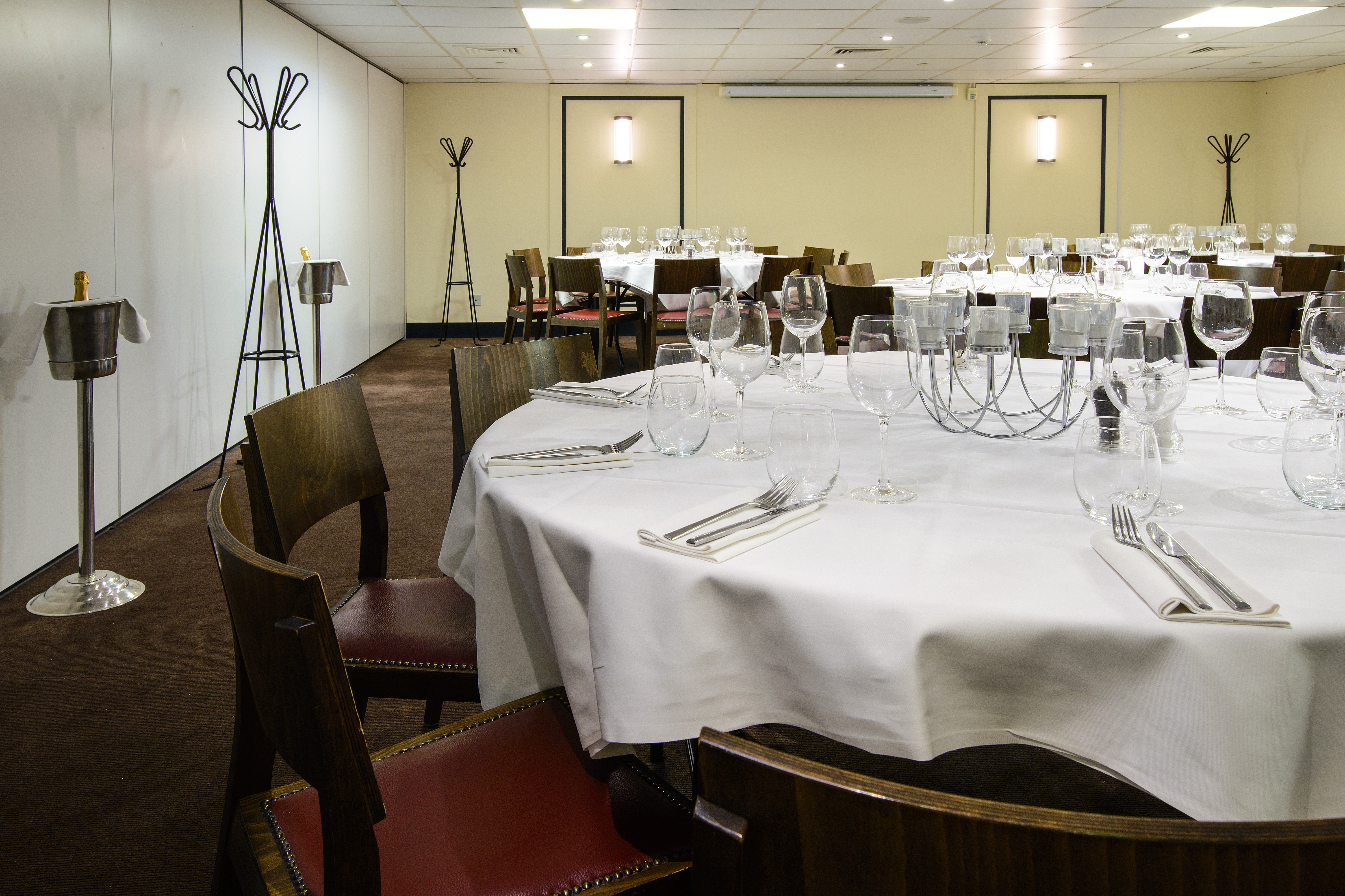 Elegant dining setup in Provence room, perfect for corporate dinners and private events.