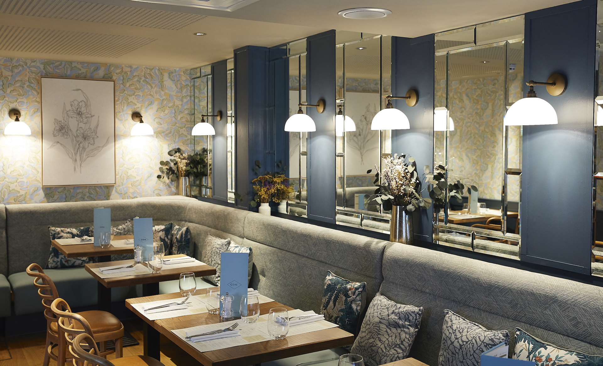 Private dining room at Cote Brasserie, elegant decor for intimate events and meetings.