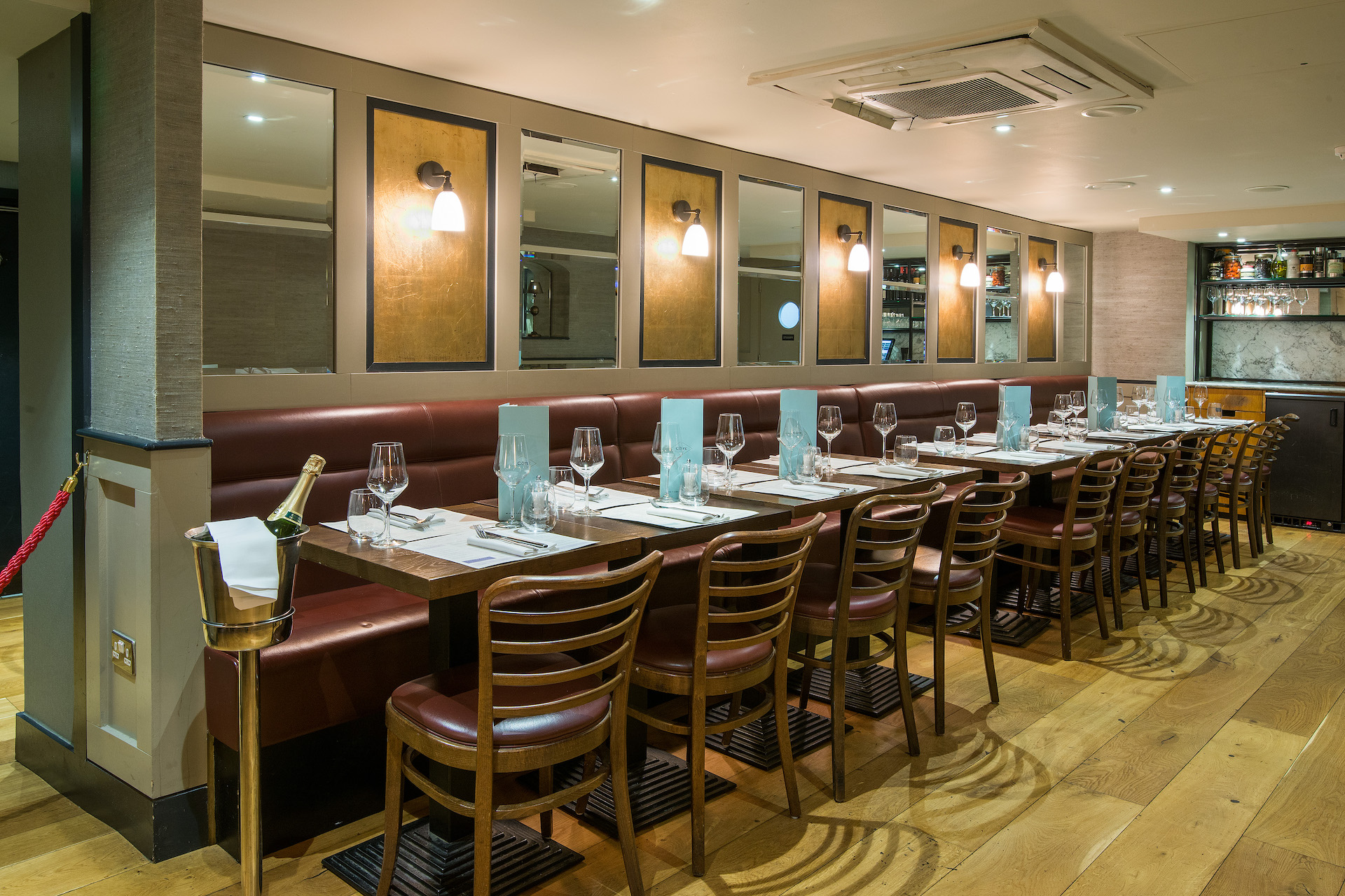 Private dining room at Cote Brasserie, elegant table setup for corporate events and gatherings.