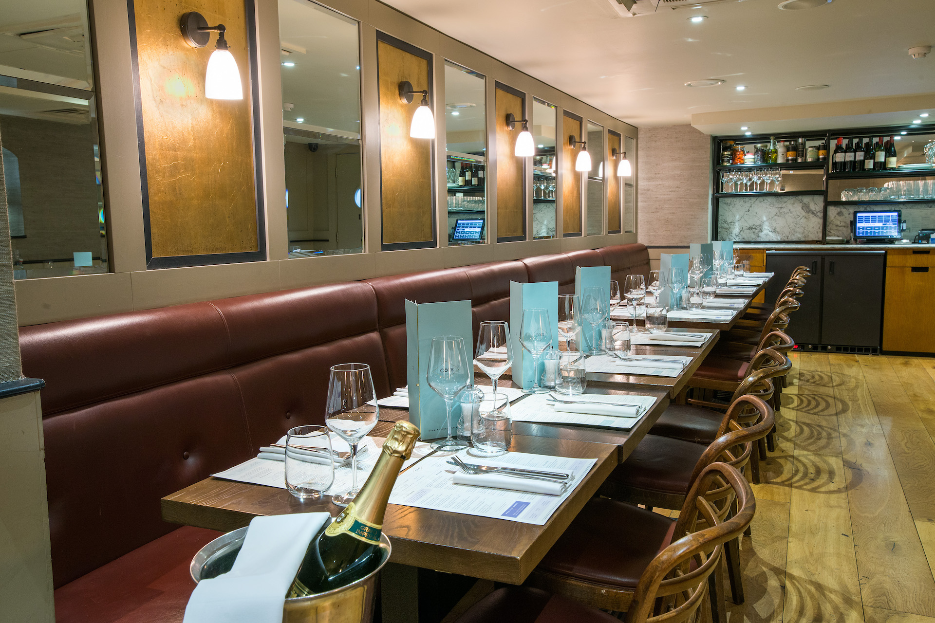 Private dining room at Cote Brasserie, elegant setup for corporate dinner or networking event.
