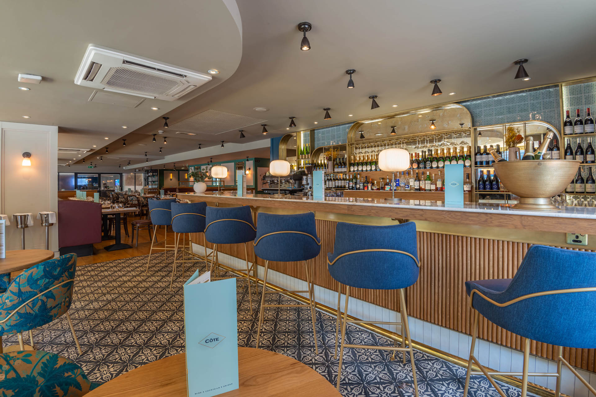 Stylish bar area in Cote Brasserie Barbican for networking events and cocktail receptions.