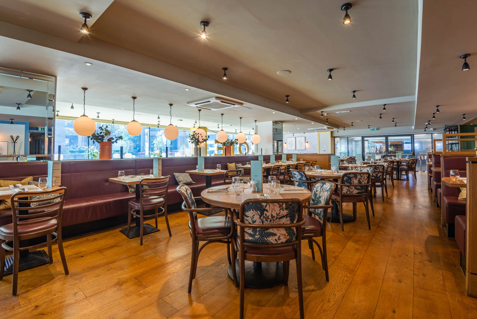 Modern dining space at Cote Brasserie Barbican, ideal for events with stylish decor.