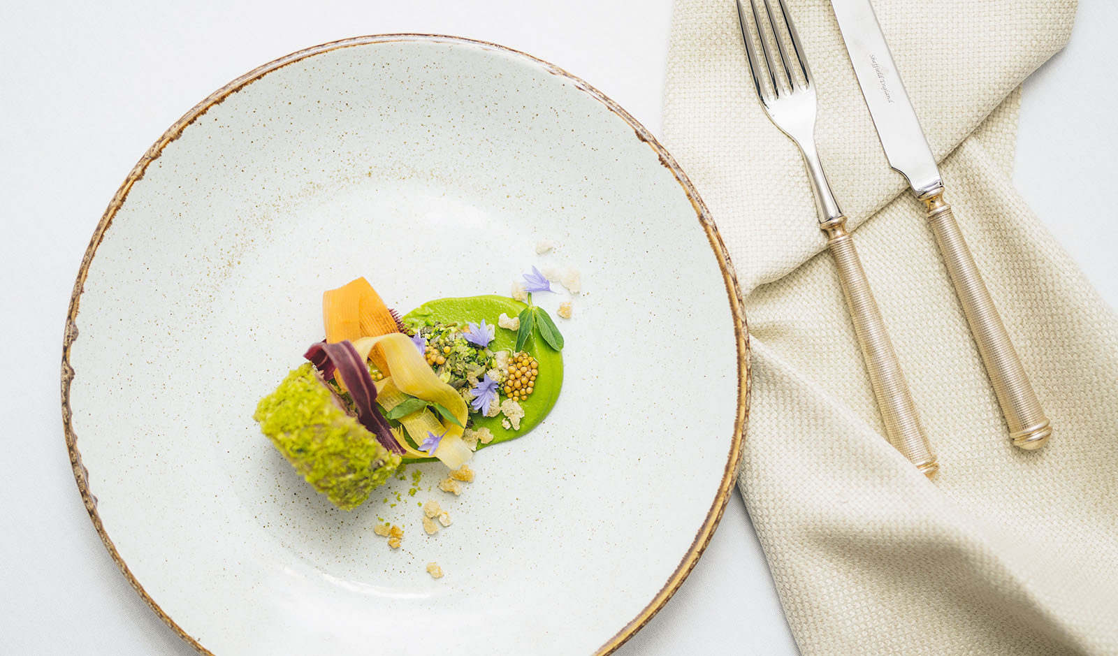 Upscale plated dish at Brewers Hall, showcasing vibrant colors for elegant events.