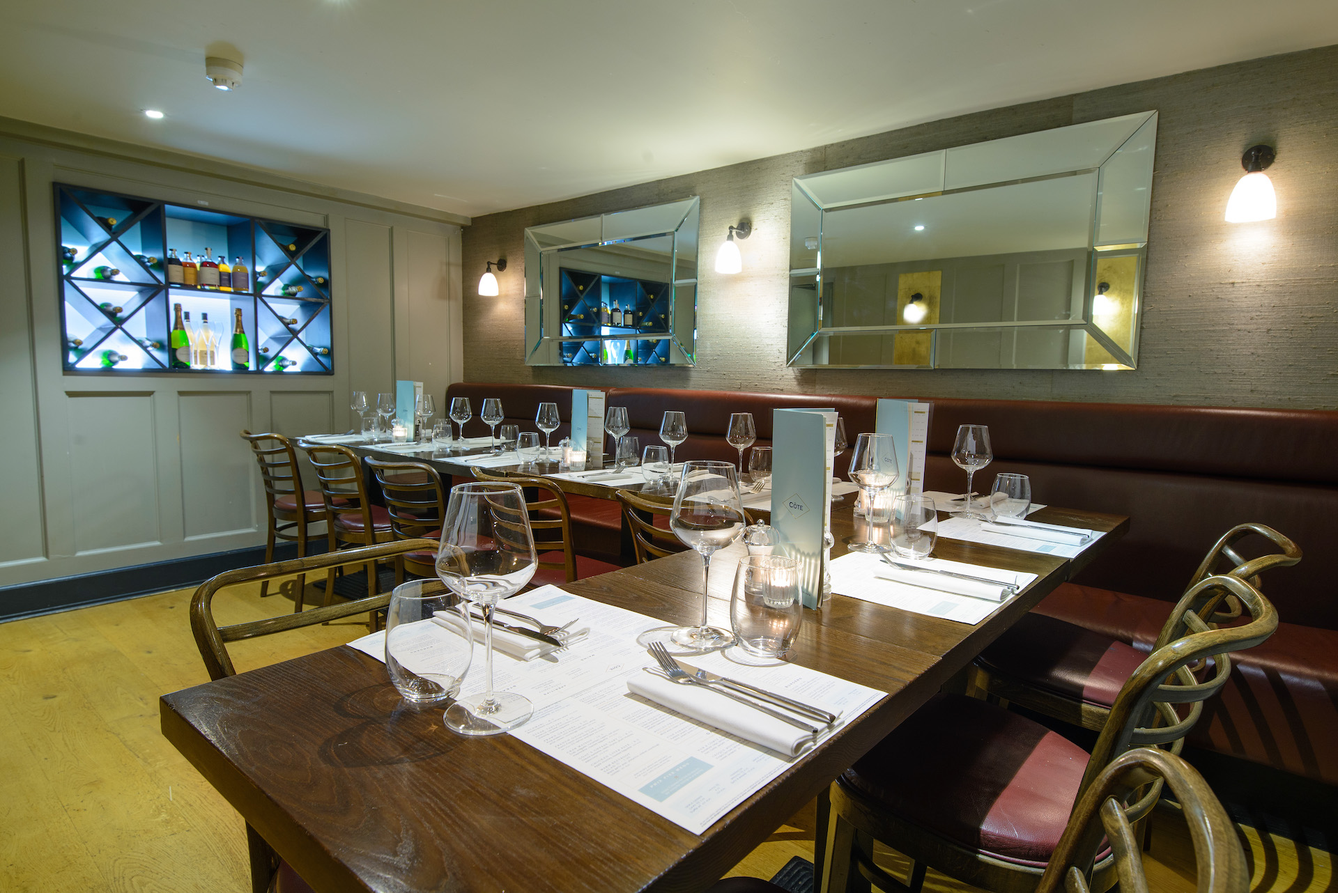 Private dining space at Cote Brasserie, elegant decor for intimate events and meetings.
