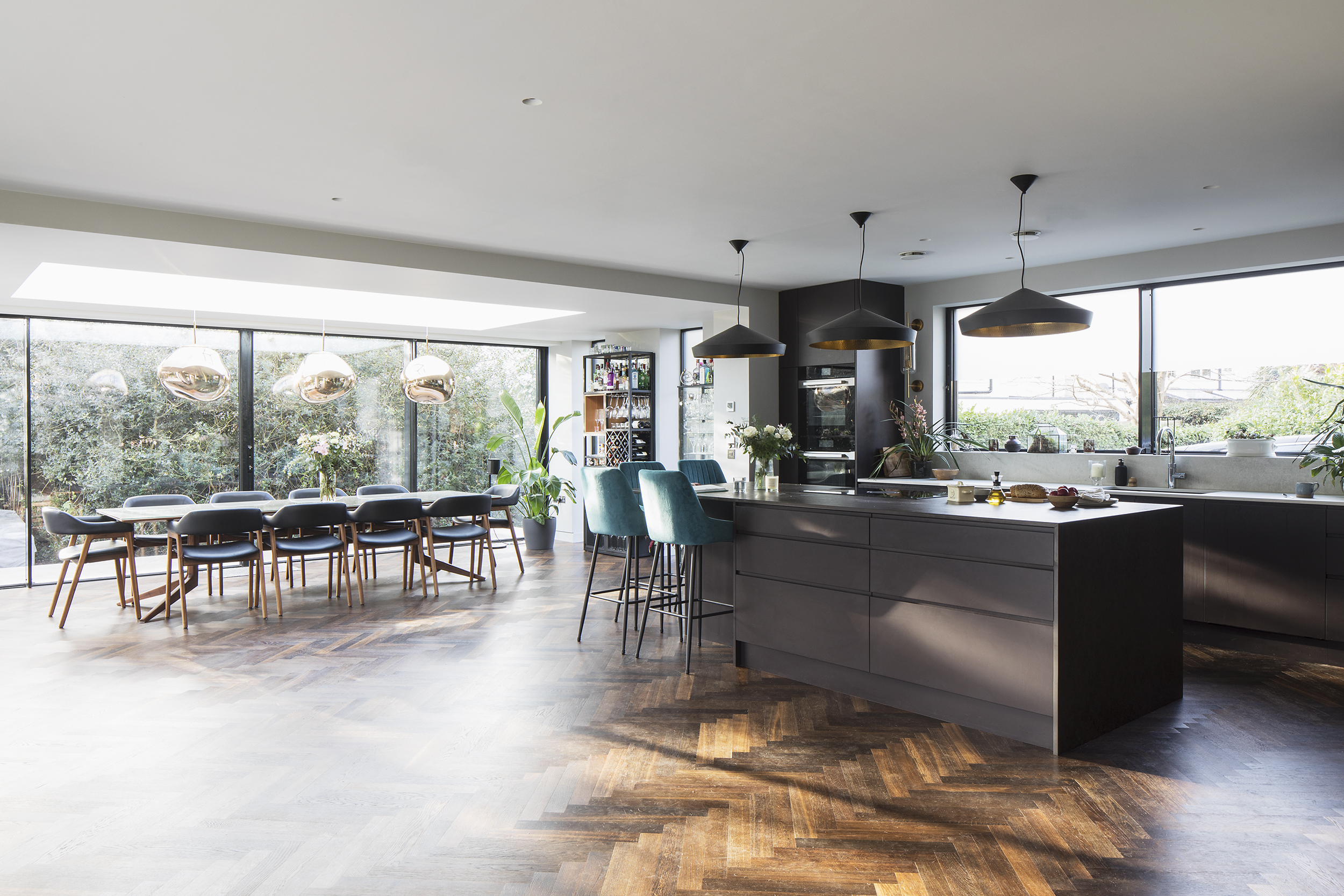 Modern kitchen and dining area in On Kew, ideal for culinary events and gatherings.