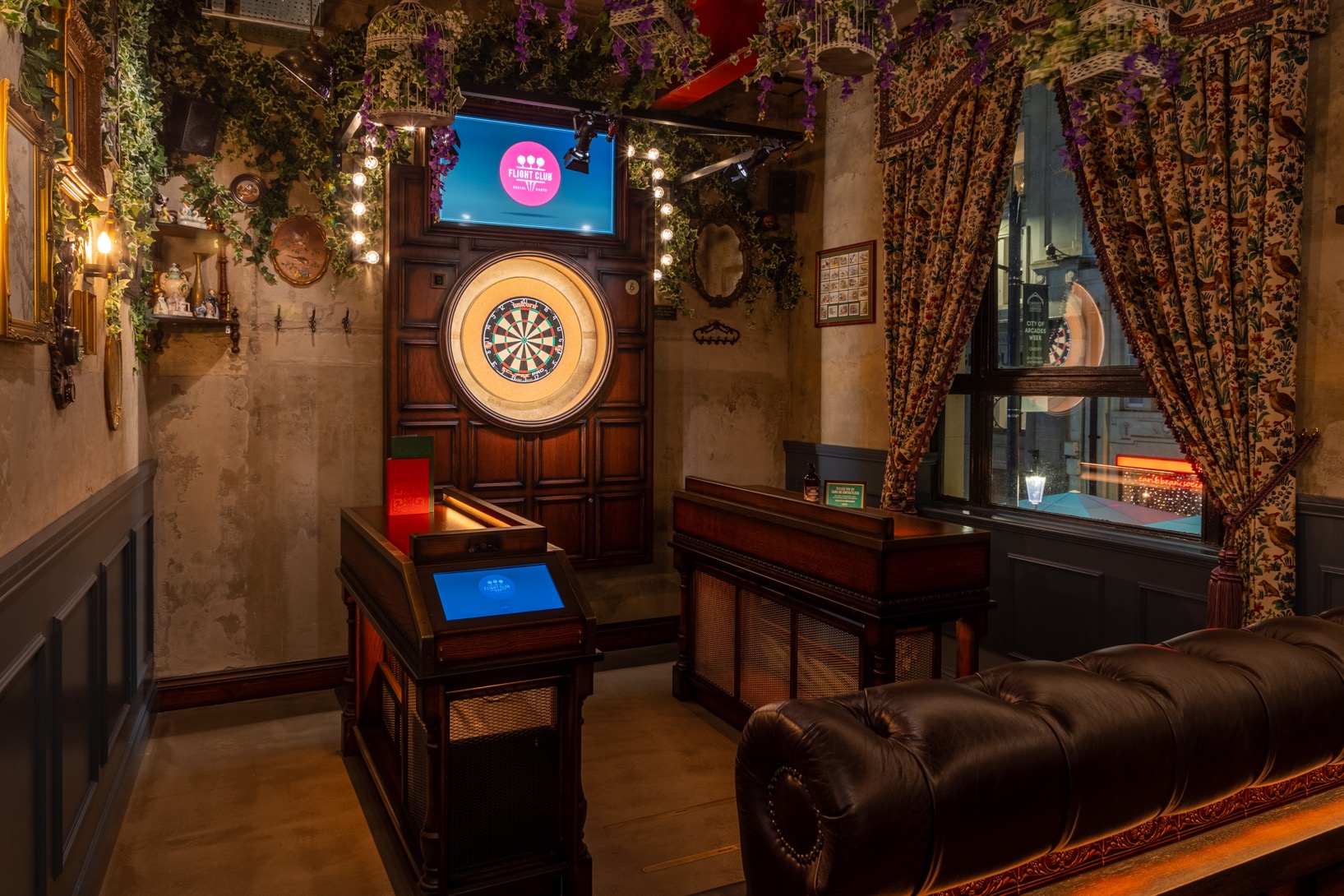 Mr Fox in Flight Club Cardiff, stylish dartboard venue for casual networking events.
