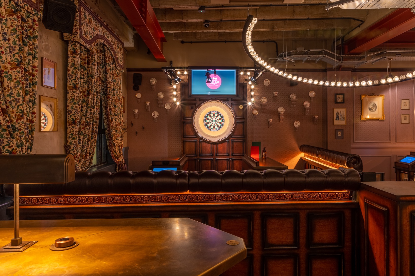 Mr Fox in Flight Club Cardiff, stylish event space with dartboard for team-building activities.