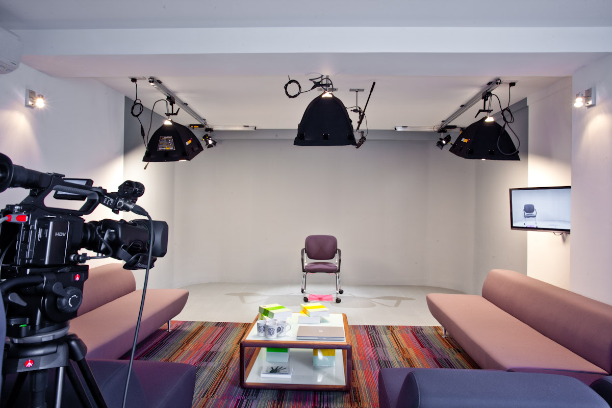 Virtual meeting studio with professional lighting for high-quality video production.