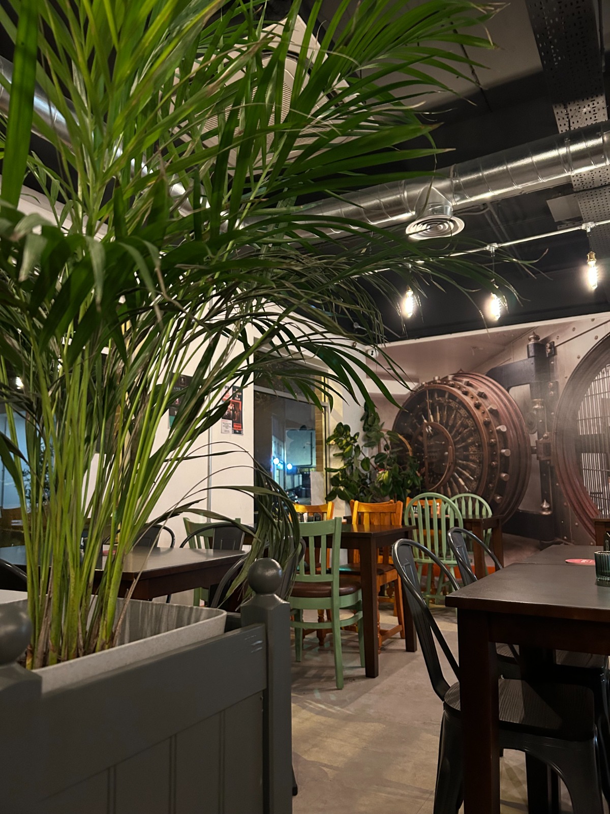 The Clarence Cafe Bar with industrial design, ideal for corporate events and gatherings.