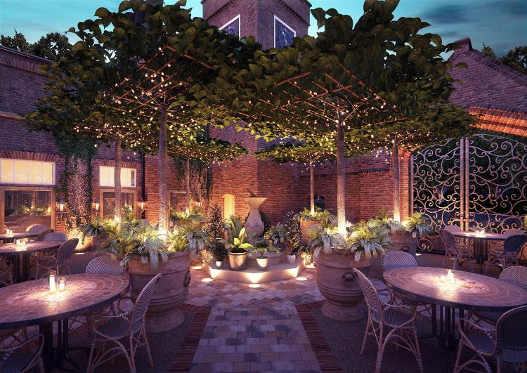 De Vere Latimer Estate outdoor event space with lush greenery, perfect for gatherings.