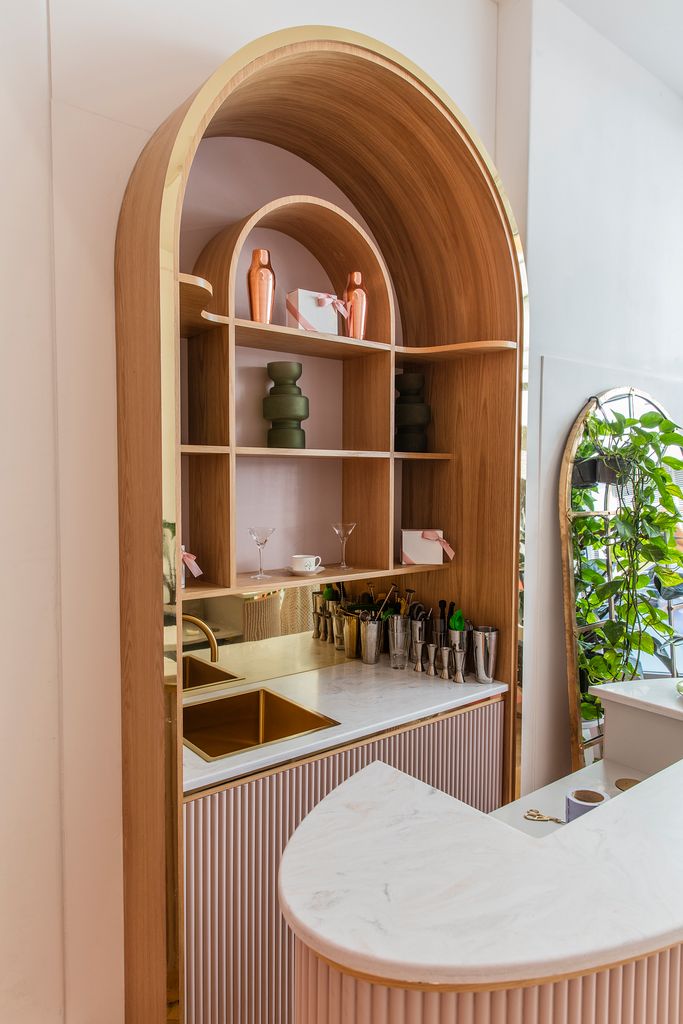 Stylish event setup in Oh La La! Kitchen Studios with elegant bar and decor for gatherings.