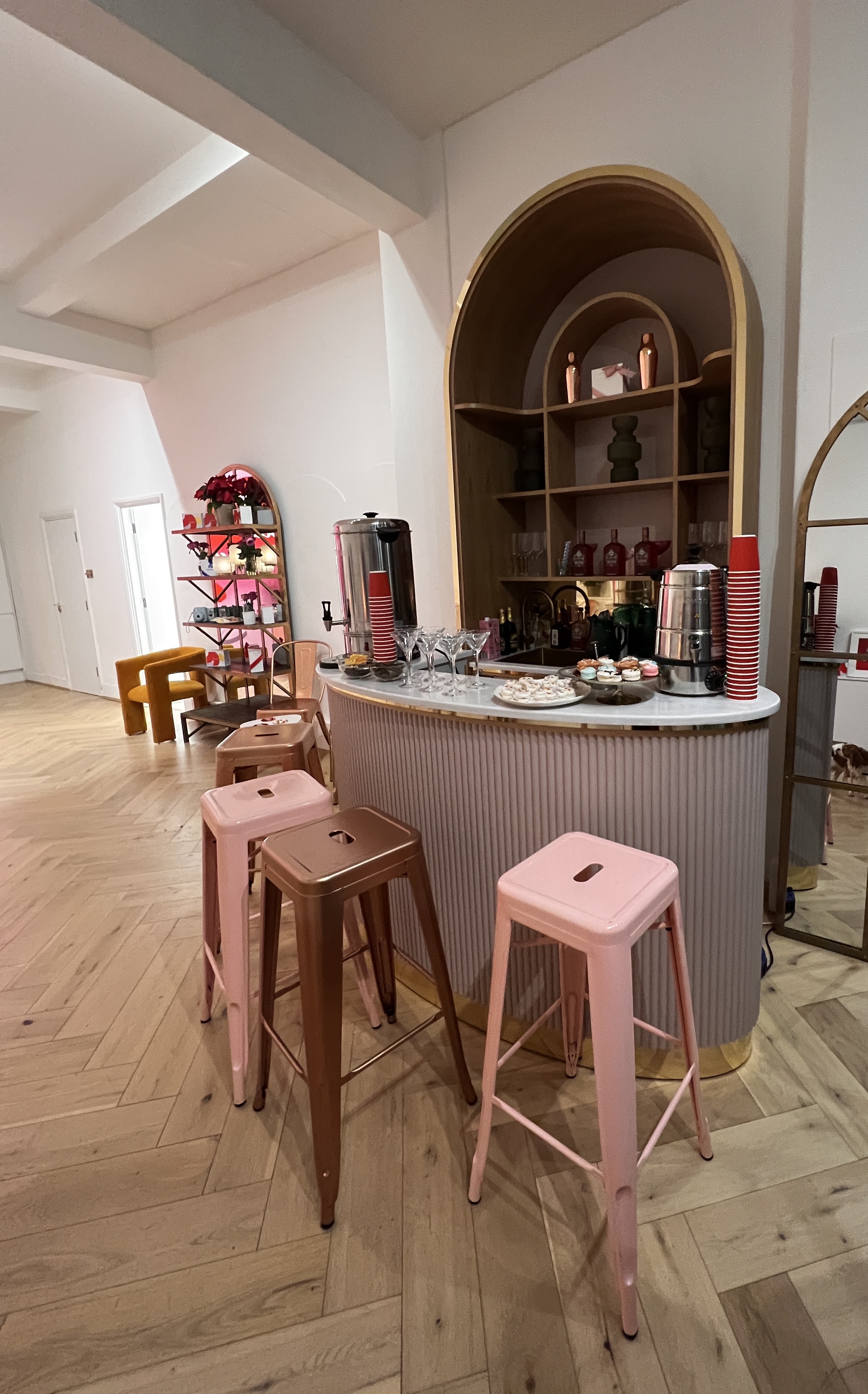 Chic event space with bar setup, ideal for networking and social gatherings.