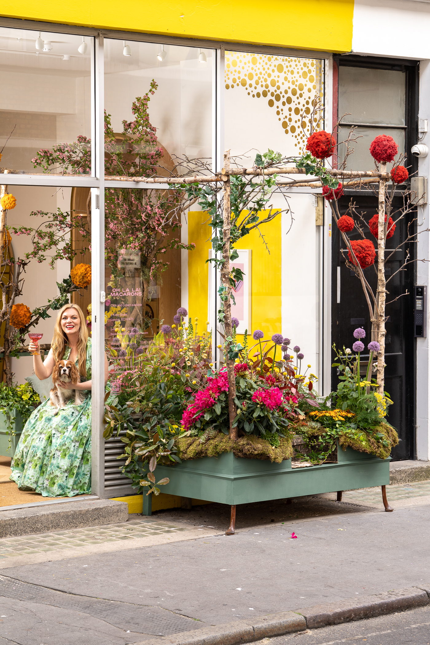 Vibrant outdoor studio space with floral decor for intimate events and gatherings.