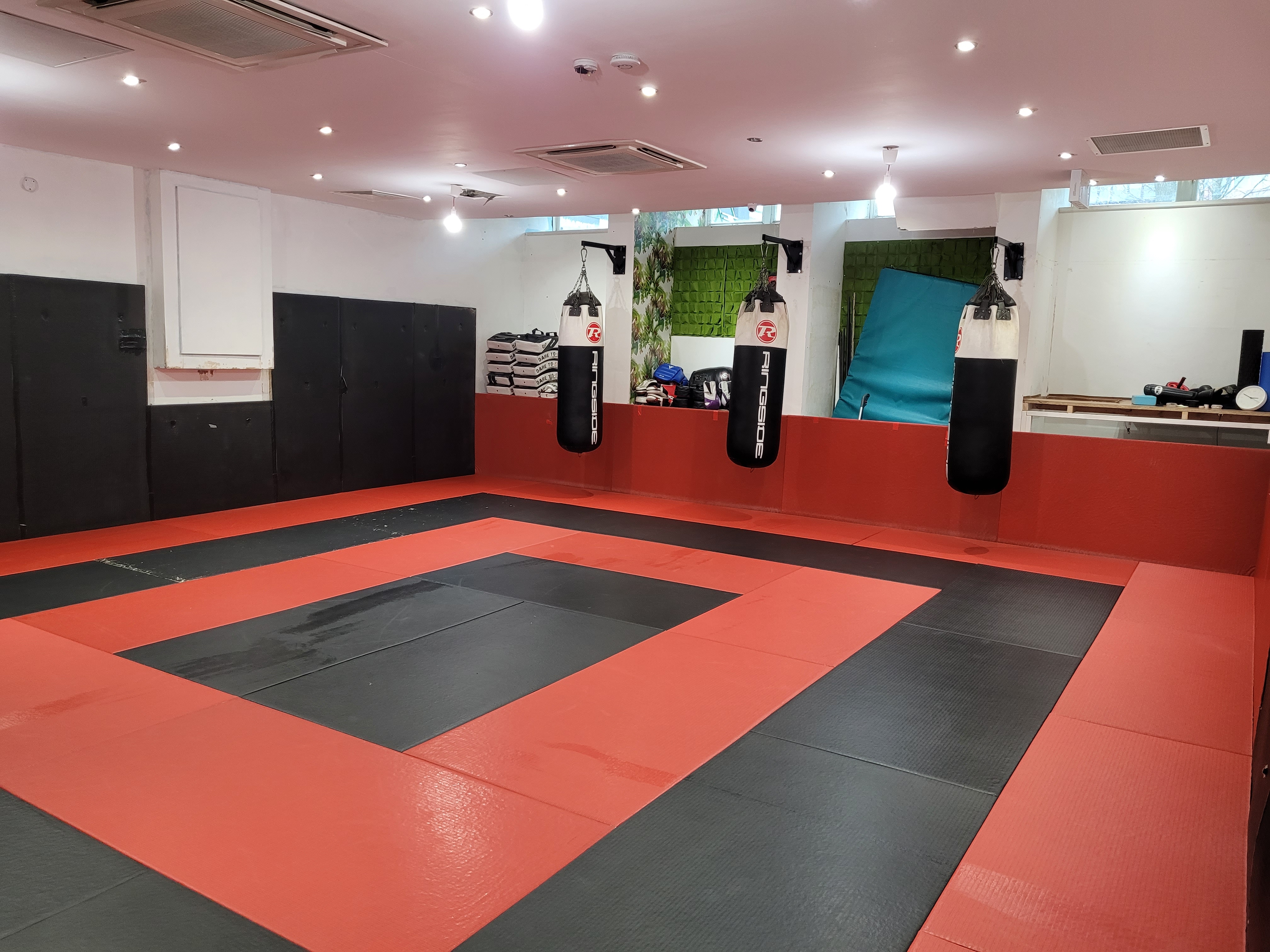 Martial Arts Studio with padded flooring for fitness events and workshops at Urban Warriors Academy.