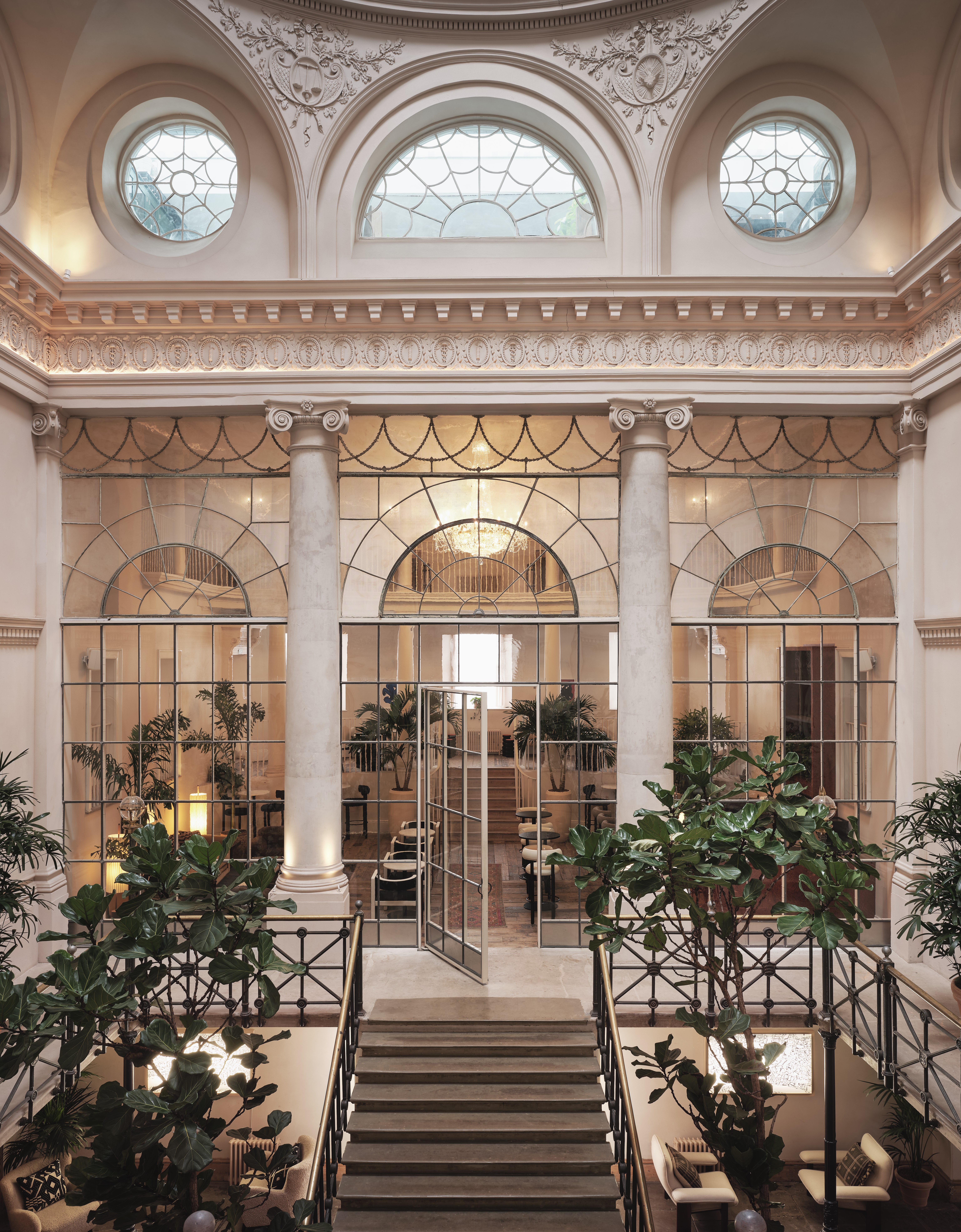 Elegant event space with tall columns, ideal for corporate meetings and social gatherings.