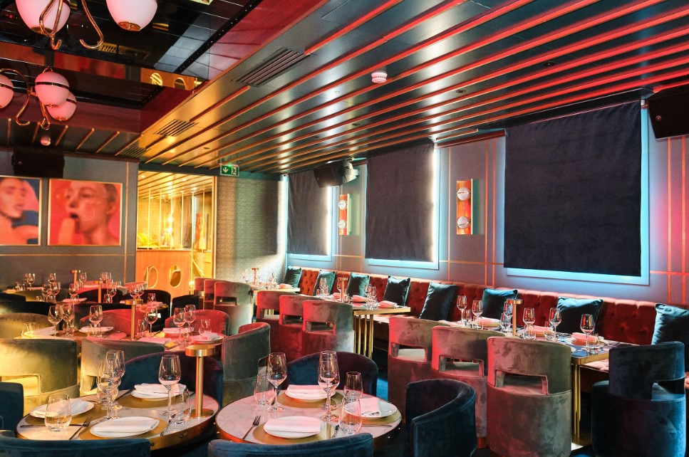 Stylish event space in The Distillery London, perfect for intimate gatherings and upscale dining.