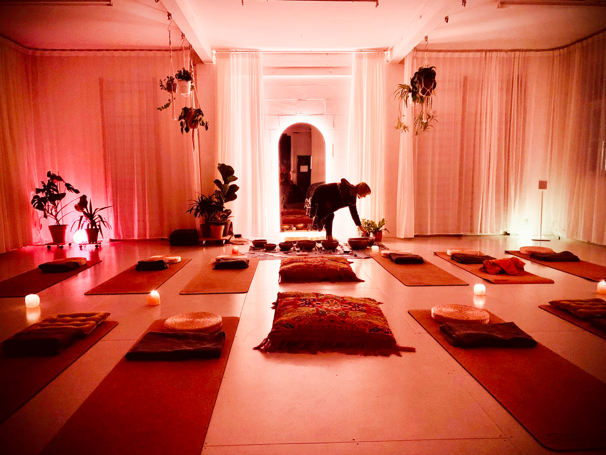Serene event space with soft lighting for yoga and meditation workshops in Soma hOme.