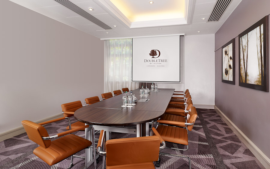 Townshend Suite meeting room with oval table, ideal for corporate events and presentations.