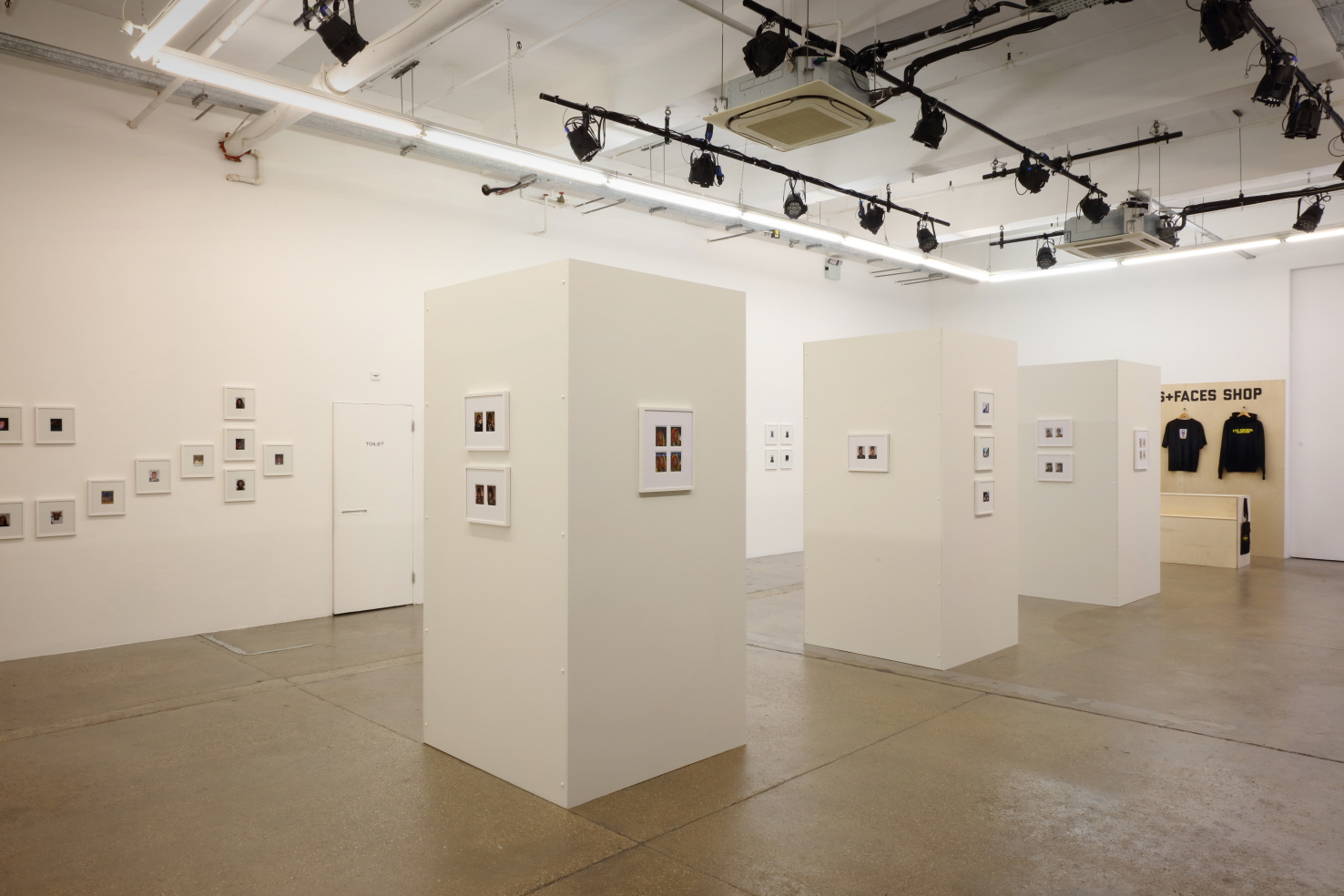 Modern gallery space with white walls for art exhibitions and corporate events.