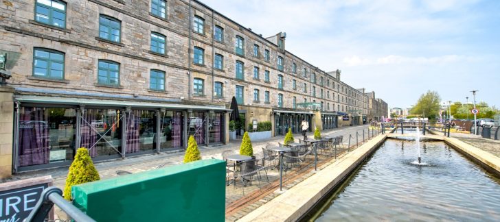 Charming waterfront meeting room with historic stone architecture in Edinburgh Leith.