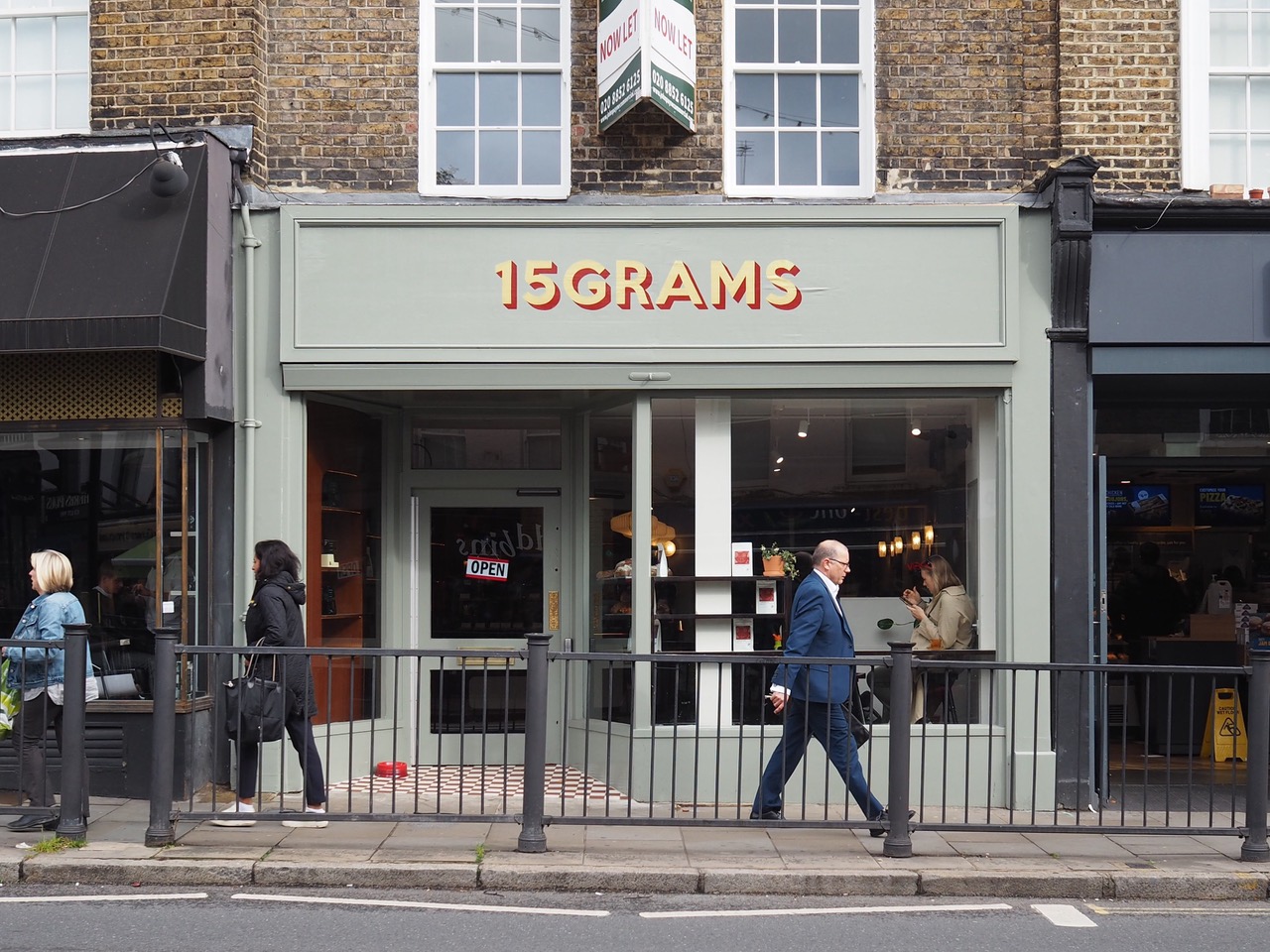 Stylish café "15GRAMS" with modern design, perfect for networking events and meetings.