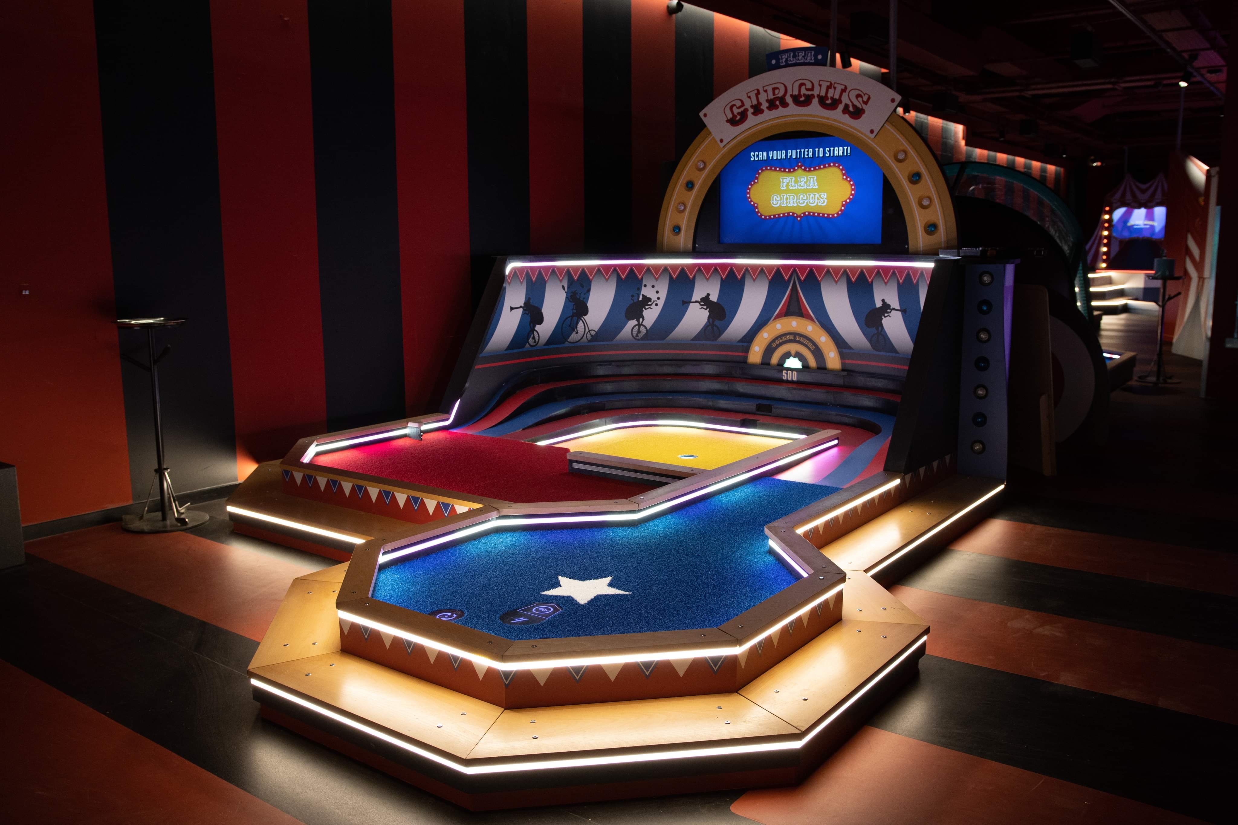 "Colorful circus-themed mini golf for engaging team-building events in Urban Playground."