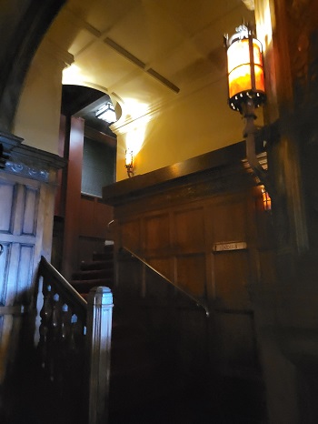 Bar 190 staircase with warm lighting, perfect for intimate cocktail receptions.