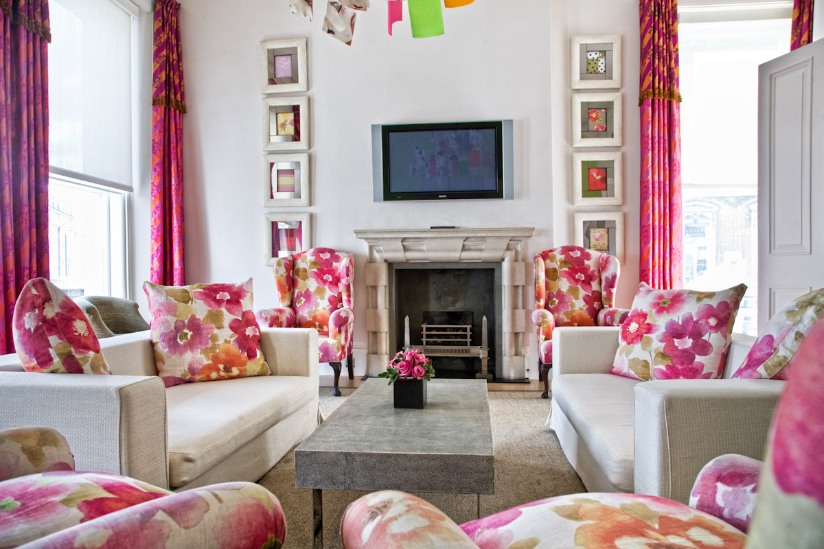 Vibrant meeting space with floral decor at The Gallery One, ideal for networking events.