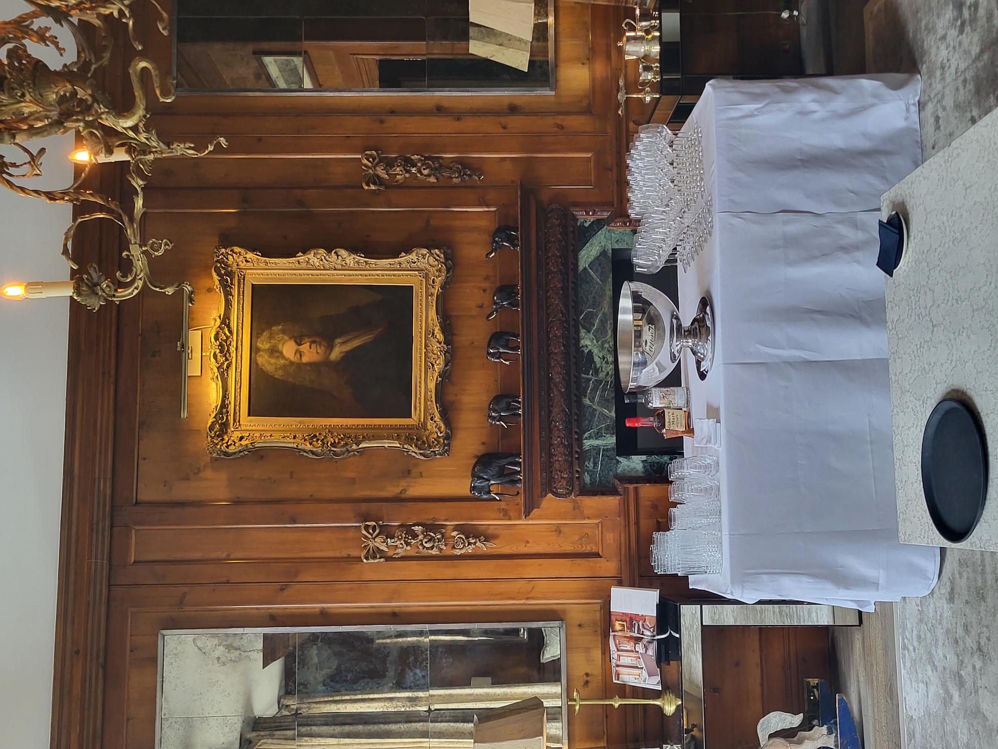 Sophisticated meeting space with wooden paneling at The Pelham Hotel for events.