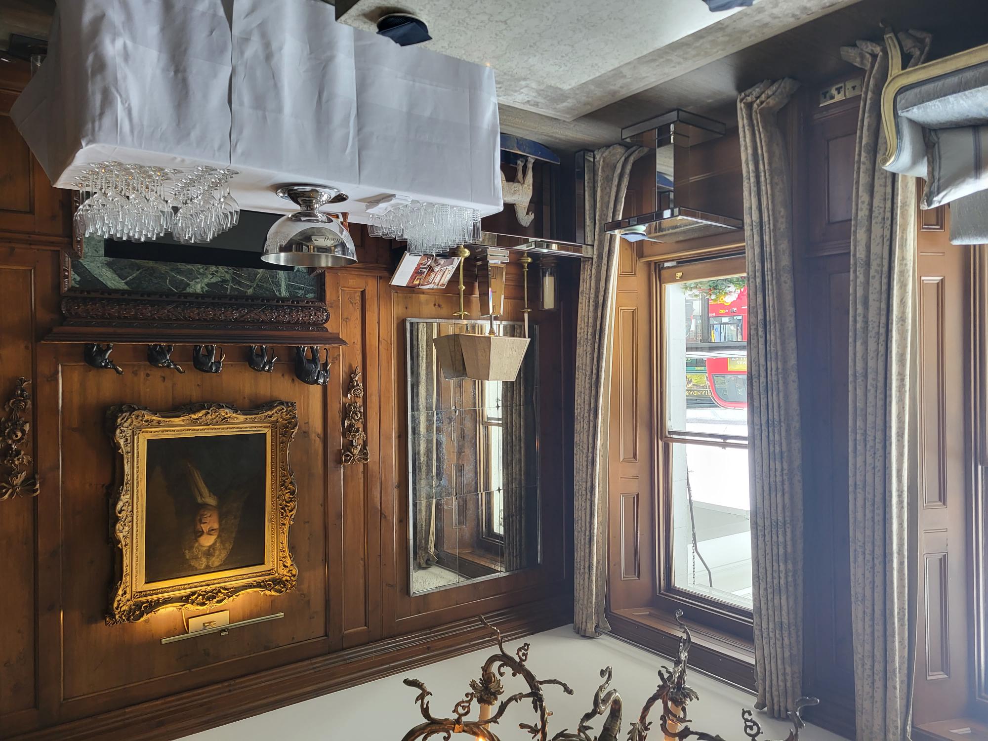 Elegant meeting space in The Pelham Hotel with wood paneling, perfect for receptions.