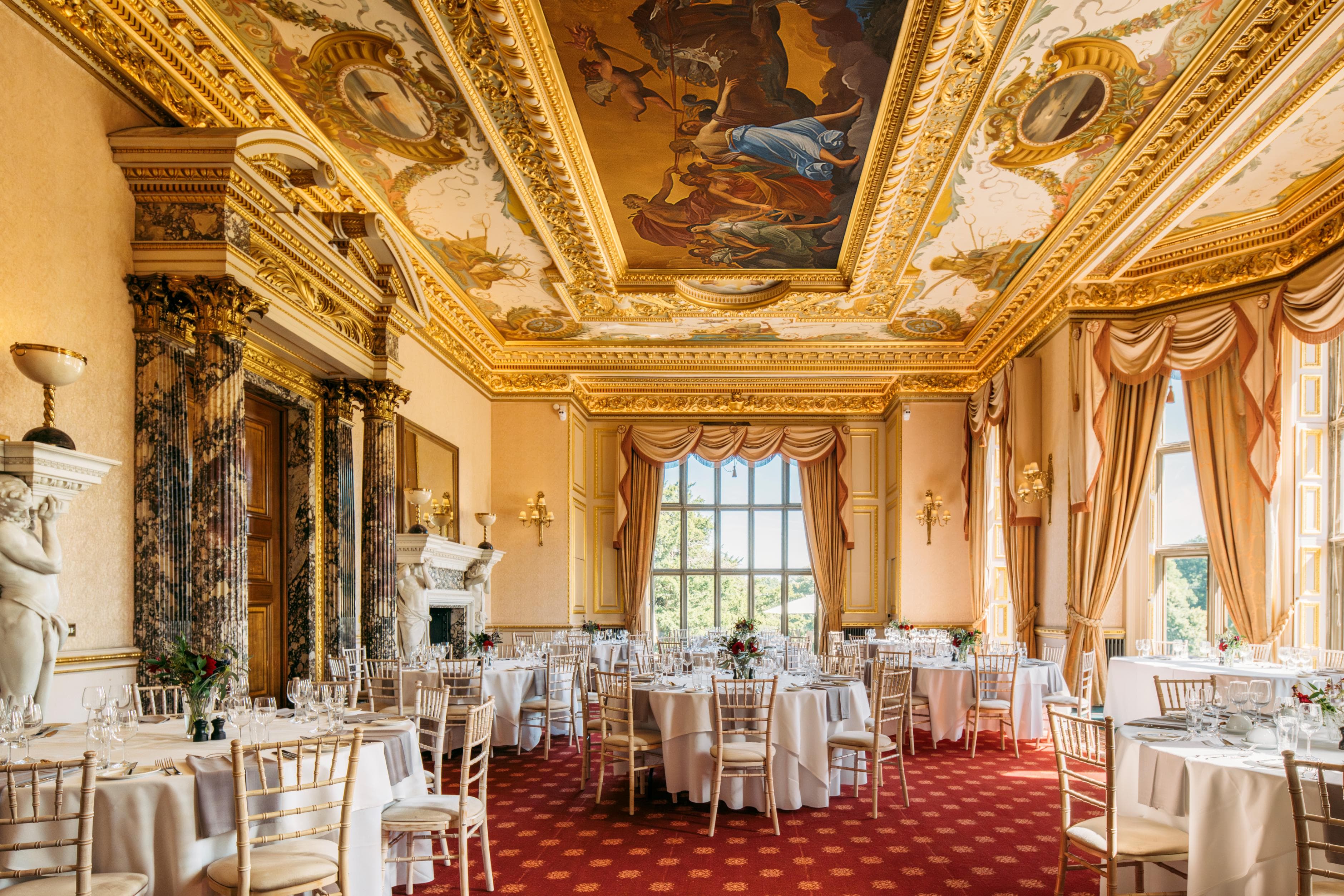Ornate gold-leaf historic banquet hall at Ashridge House for premium gala and upscale wedding events.