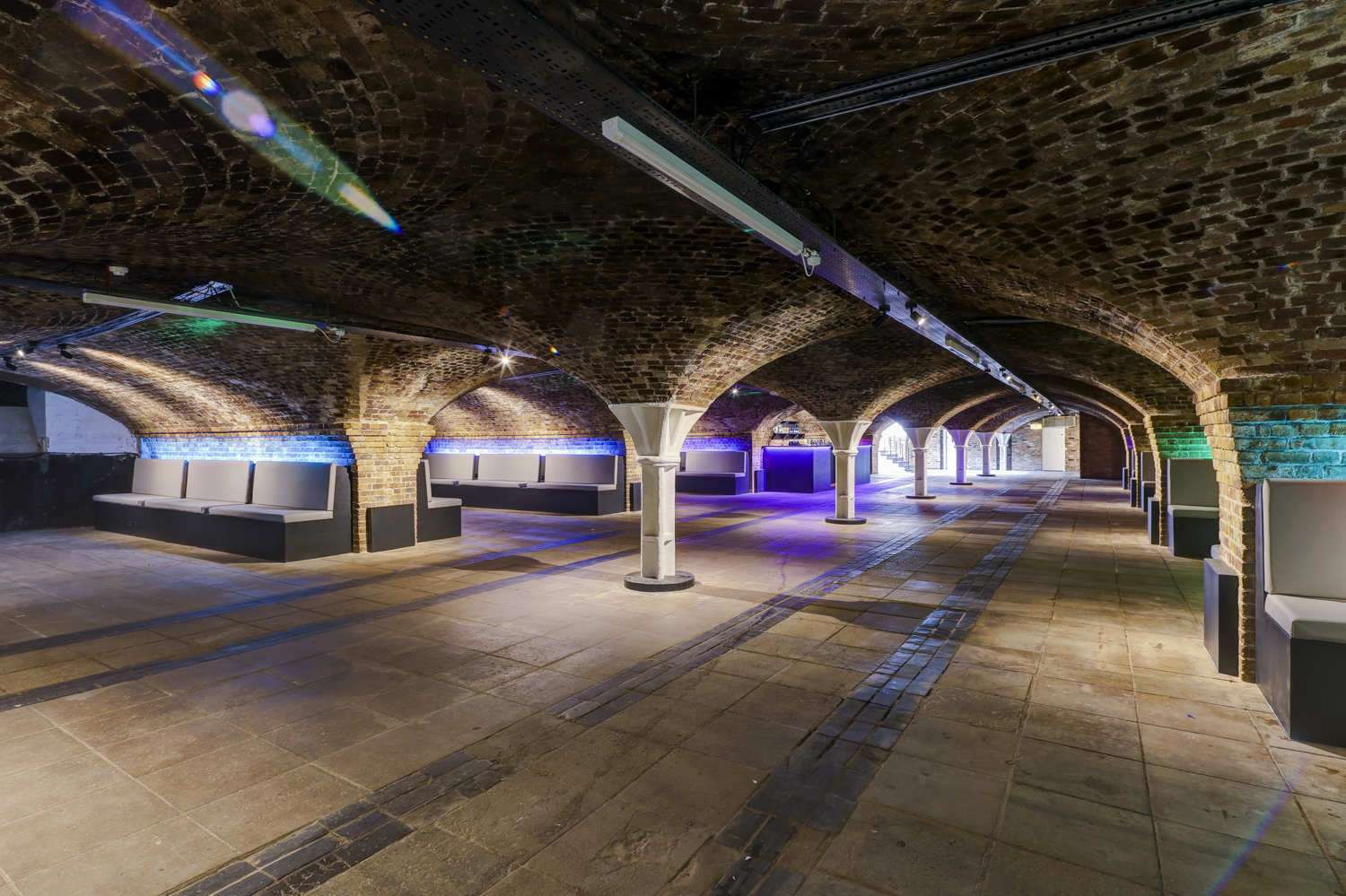 Spacious Dockside Vaults venue with arched brick ceilings for events and receptions.