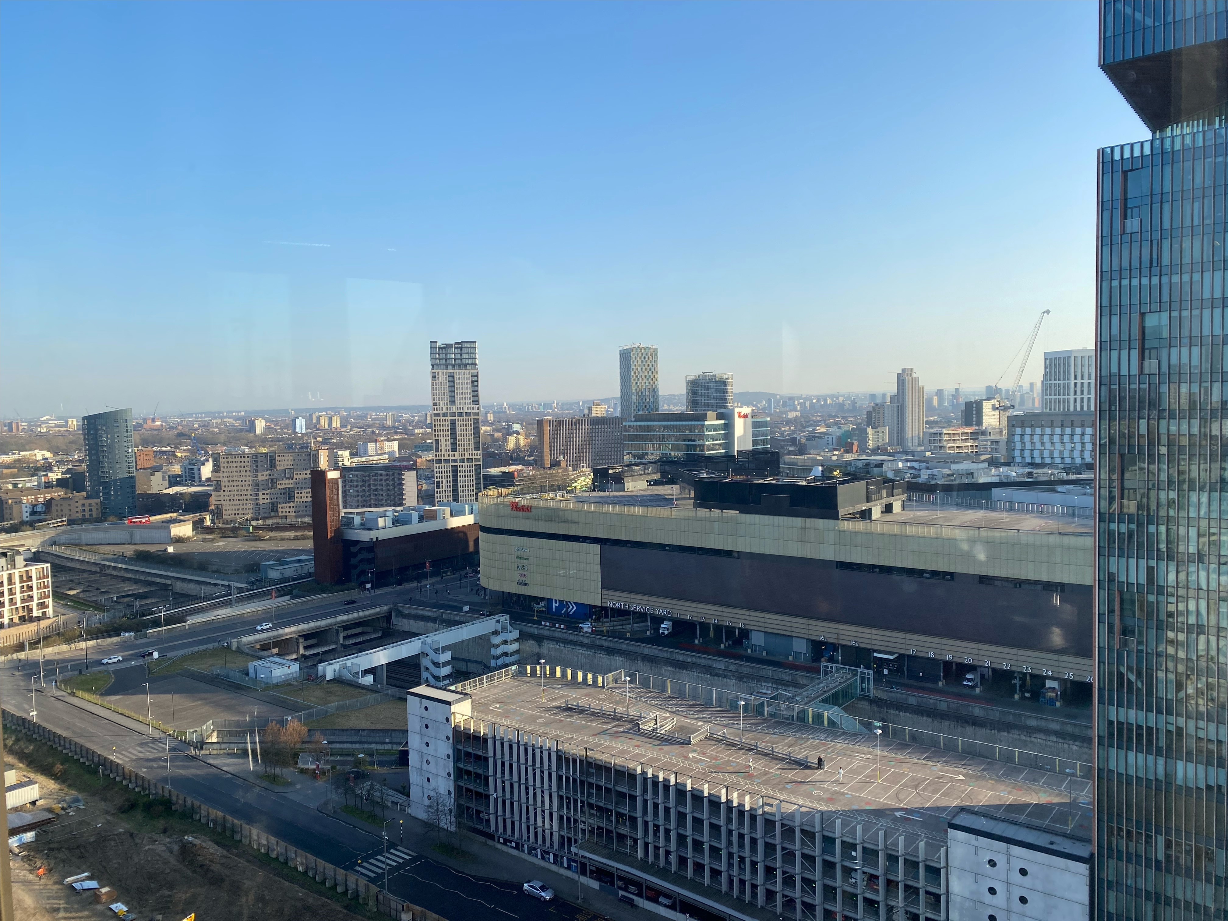 Private dining room at STK Rooftop Stratford with urban view, perfect for events.