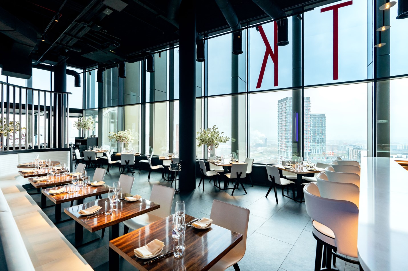 Modern upscale restaurant with city views, ideal for corporate events and private gatherings.