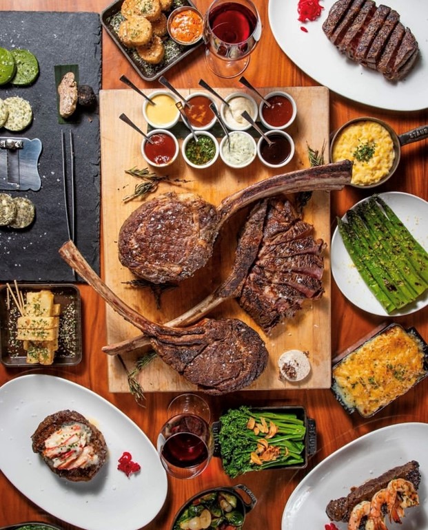 Tomahawk steak feast at STK Rooftop, ideal for corporate events and fine dining.