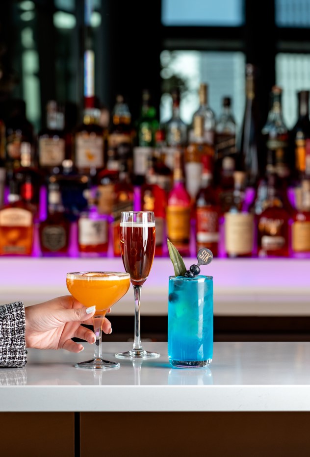 Vibrant cocktails at STK Rooftop Stratford for networking and celebratory events.