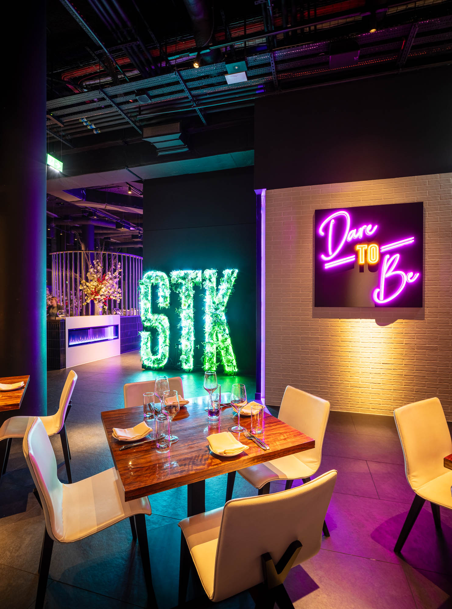 Full Venue at STK Rooftop Stratford, featuring elegant tables for upscale events.