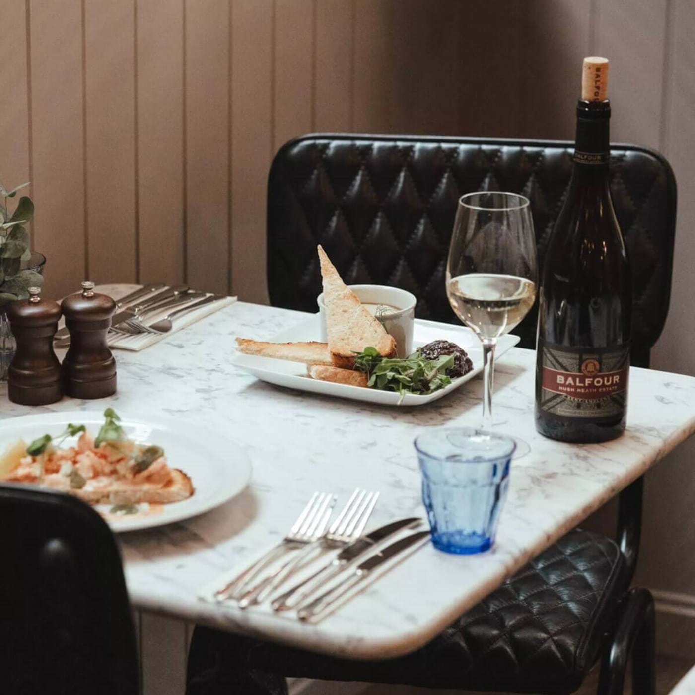 Private dining room with elegant table setting for corporate lunch or networking event.