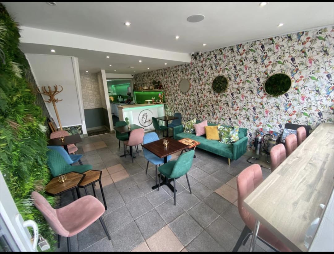 Vibrant Railton Lounge venue with eclectic seating for intimate gatherings and workshops.