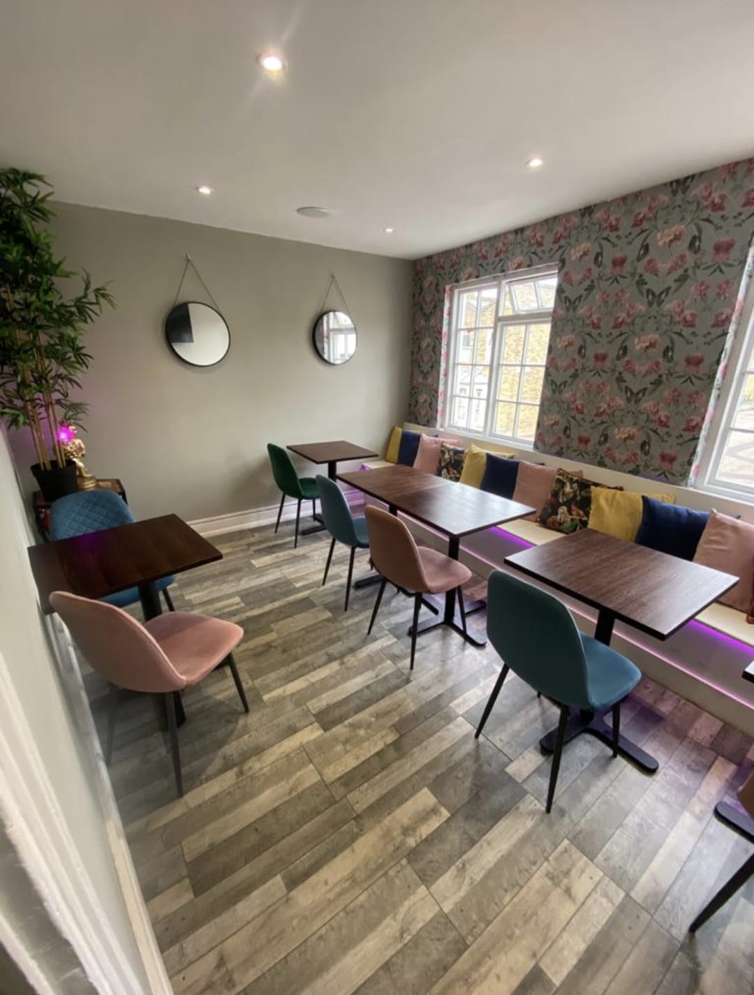 Cozy Railton Lounge venue with colorful chairs for workshops and team meetings.