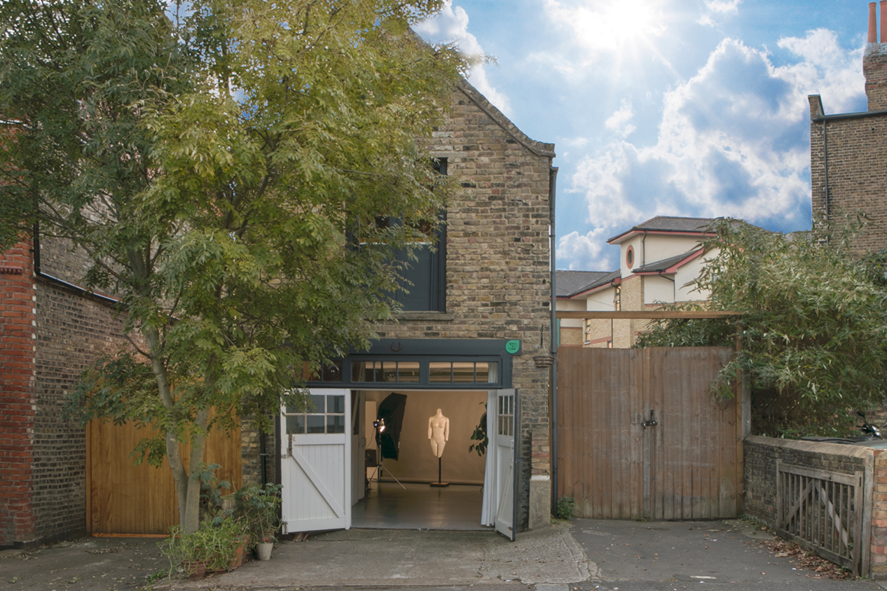 Charming North London Green Studio with rustic exterior, ideal for creative events and workshops.