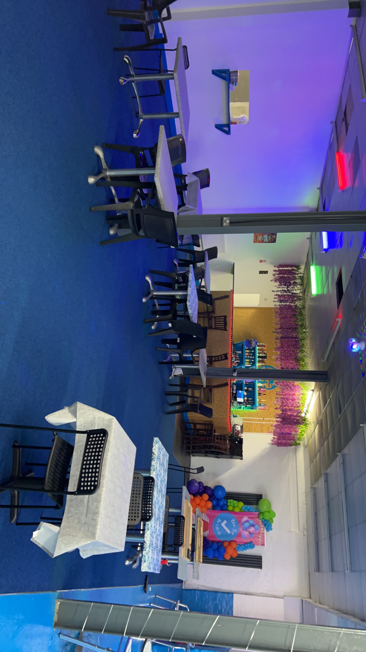 Blue Tick Bar and Grill event space with colorful lighting for celebrations and meetings.