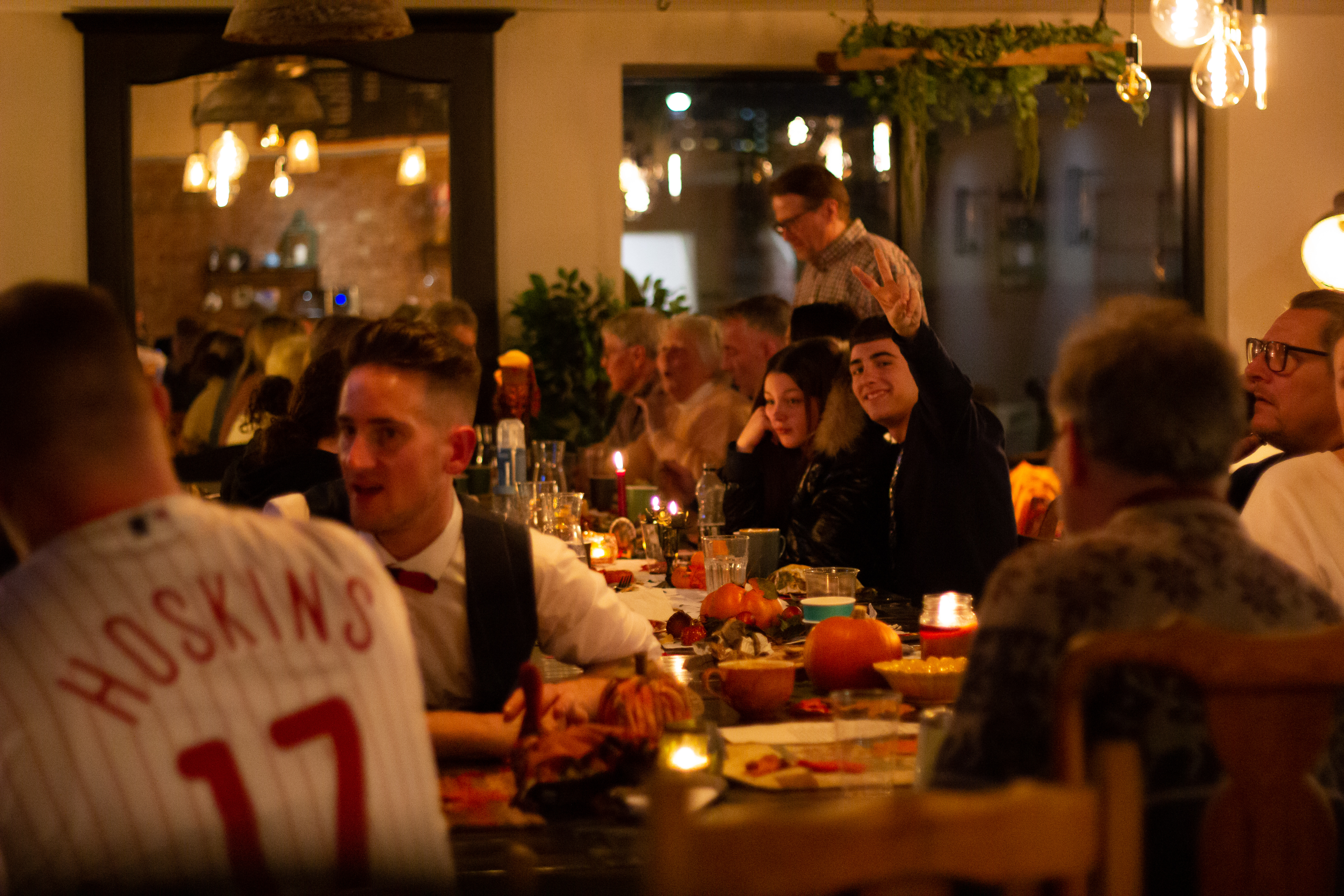 Rising Cafe dinner event with guests at a beautifully set table, ideal for networking.