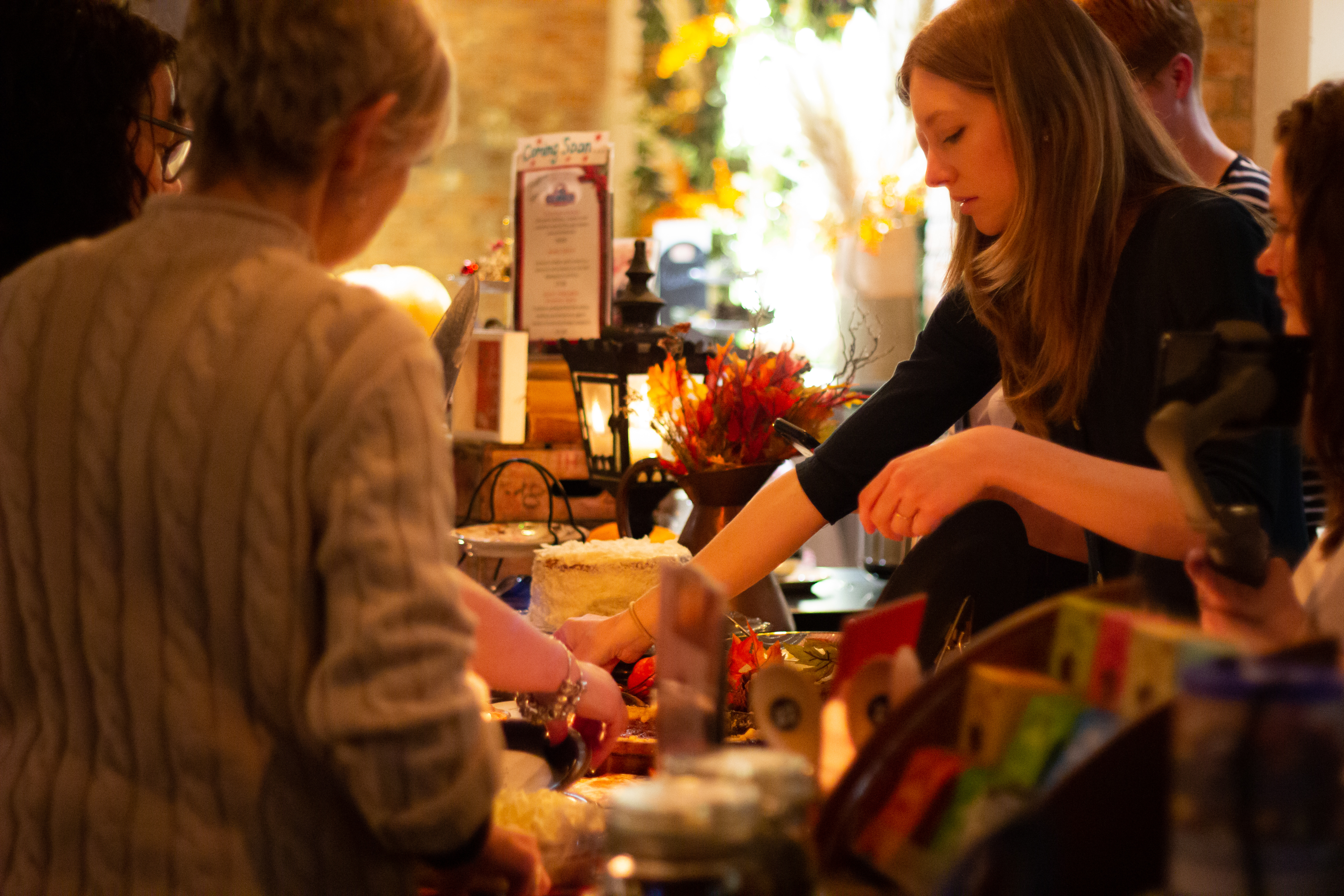 Rising Cafe buffet event in Anchor Point with warm lighting and vibrant atmosphere.