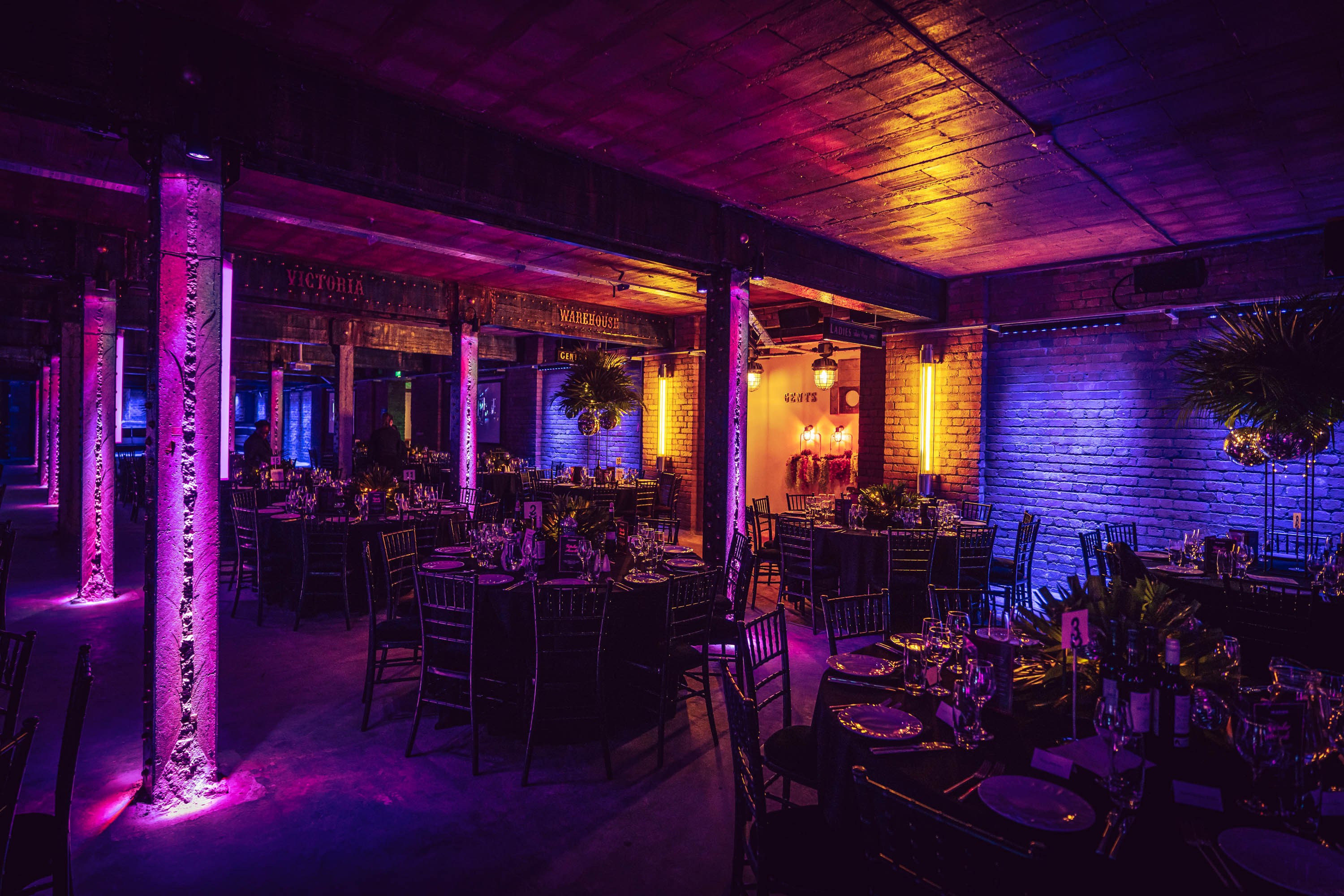 Elegant dinner setup in Tobacco Stores, Victoria Warehouse for corporate events and celebrations.