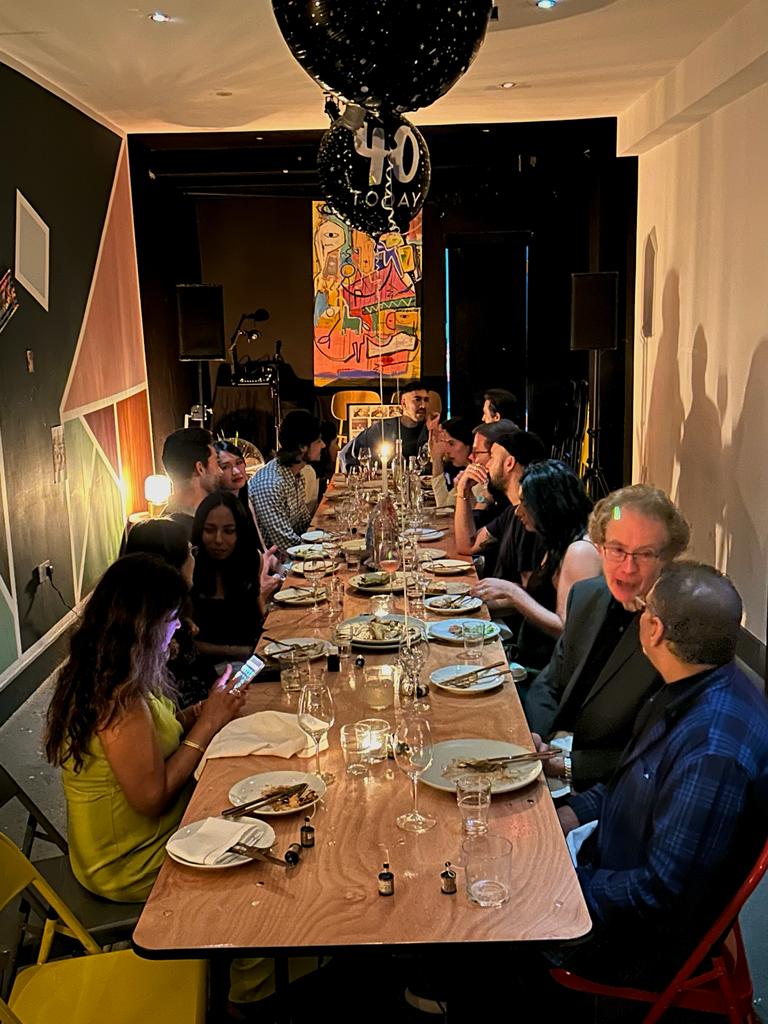 Vibrant dinner setting in Hackney Coterie for networking and gatherings.