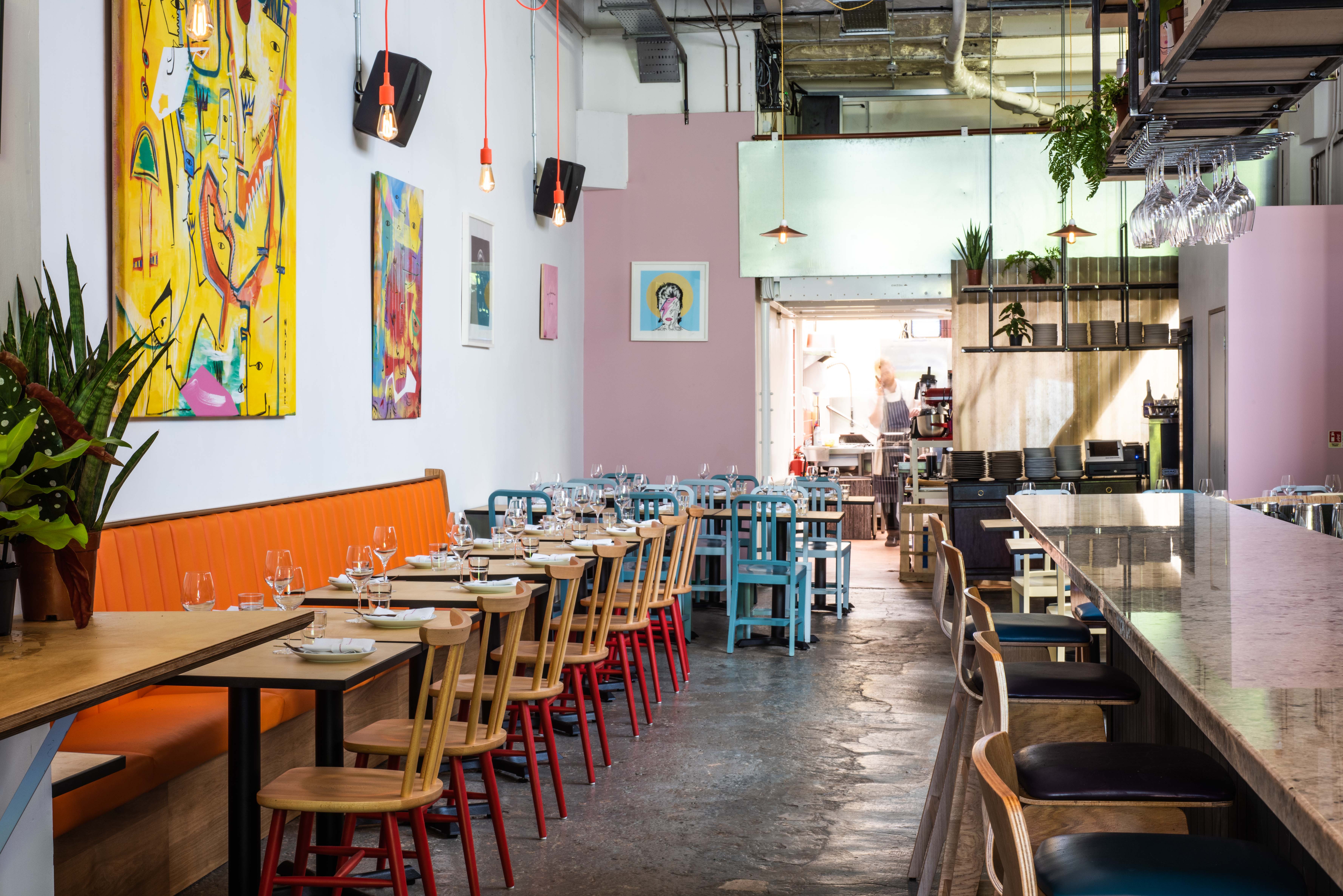 Vibrant Hackney Coterie restaurant with colorful decor for gatherings and meetings.