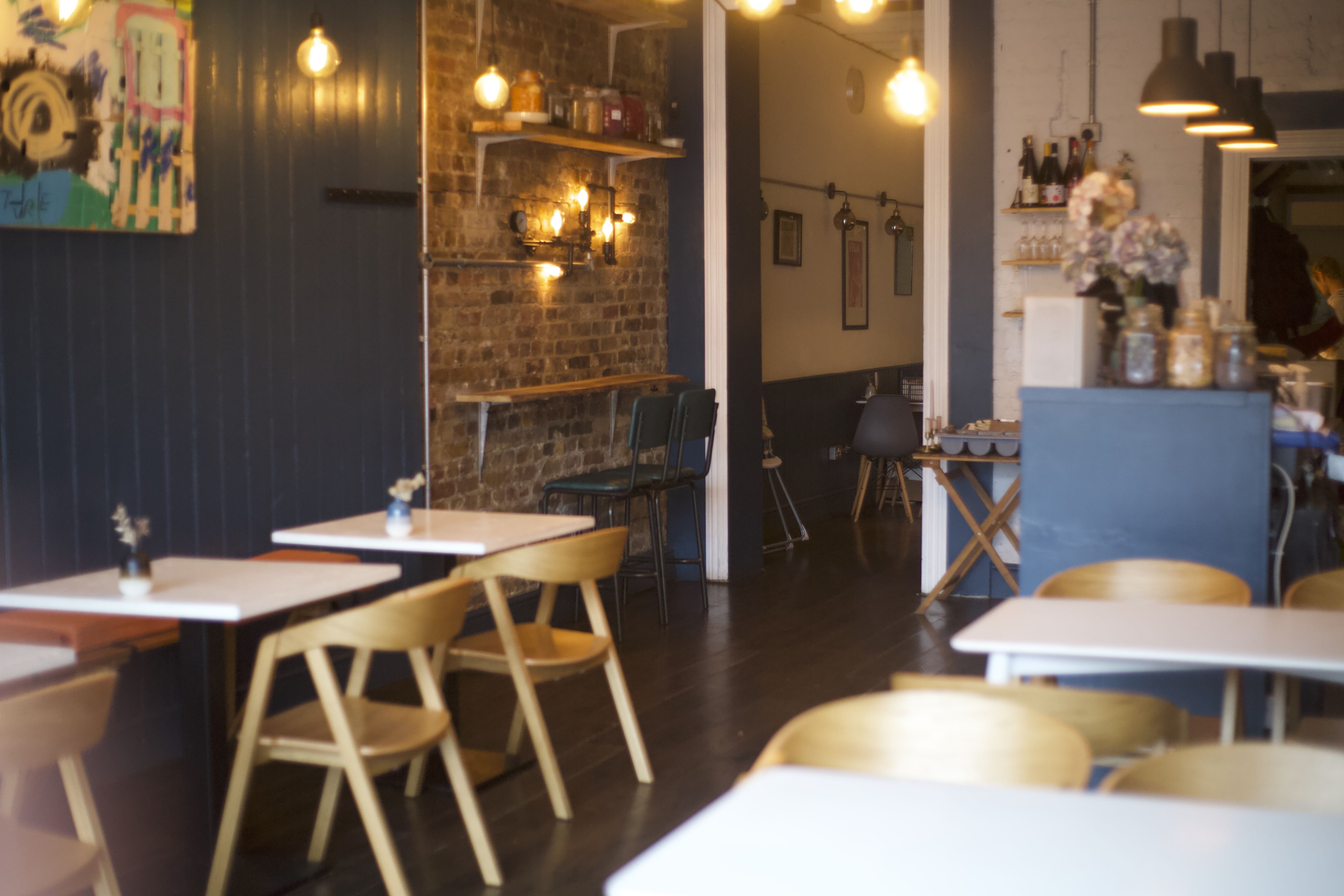 Cozy venue with rustic decor for intimate meetings and small events.